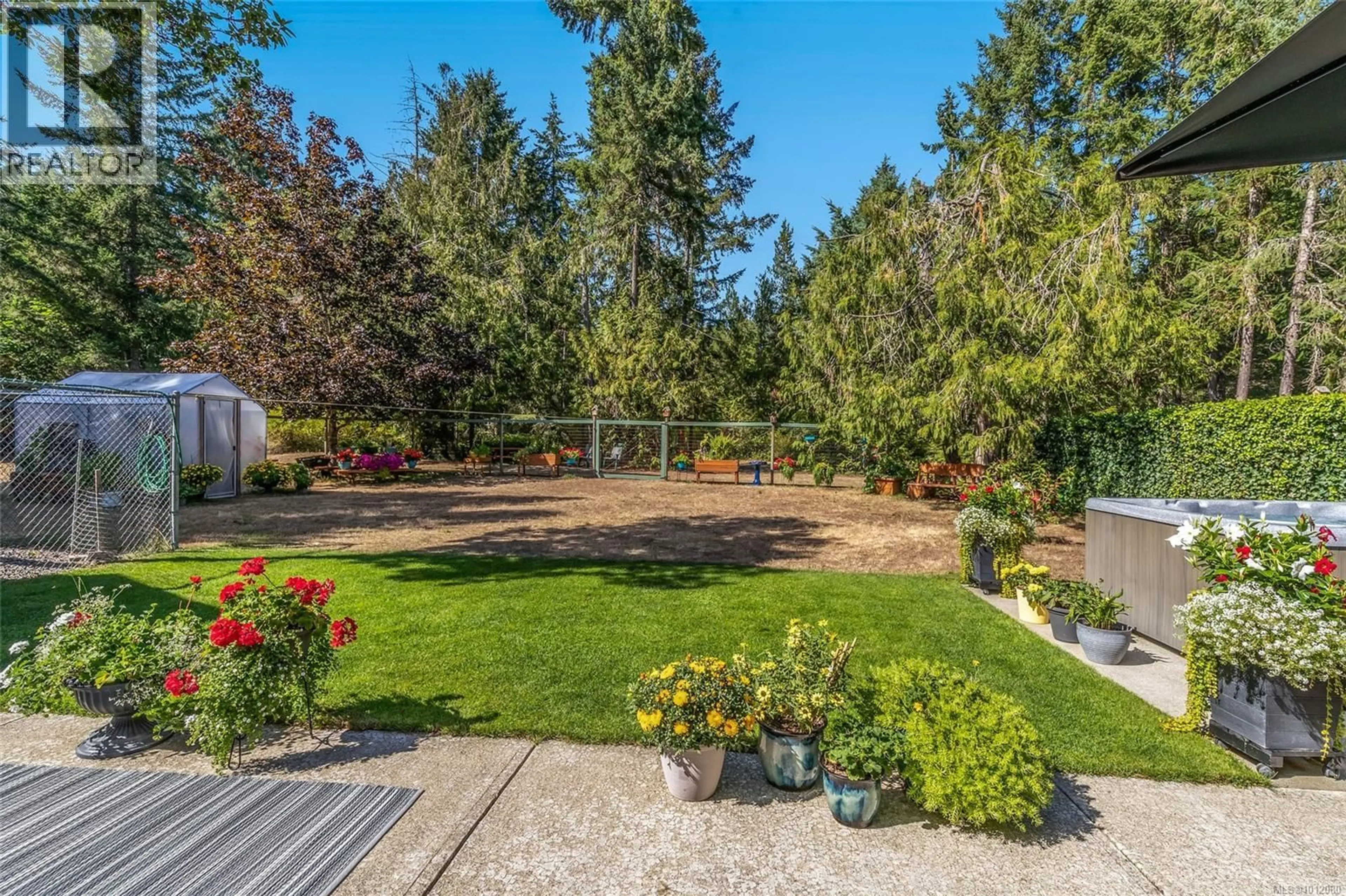 A pic from outside/outdoor area/front of a property/back of a property/a pic from drone, unknown for 1569 BENZON CRESCENT, Errington British Columbia V0R1V0