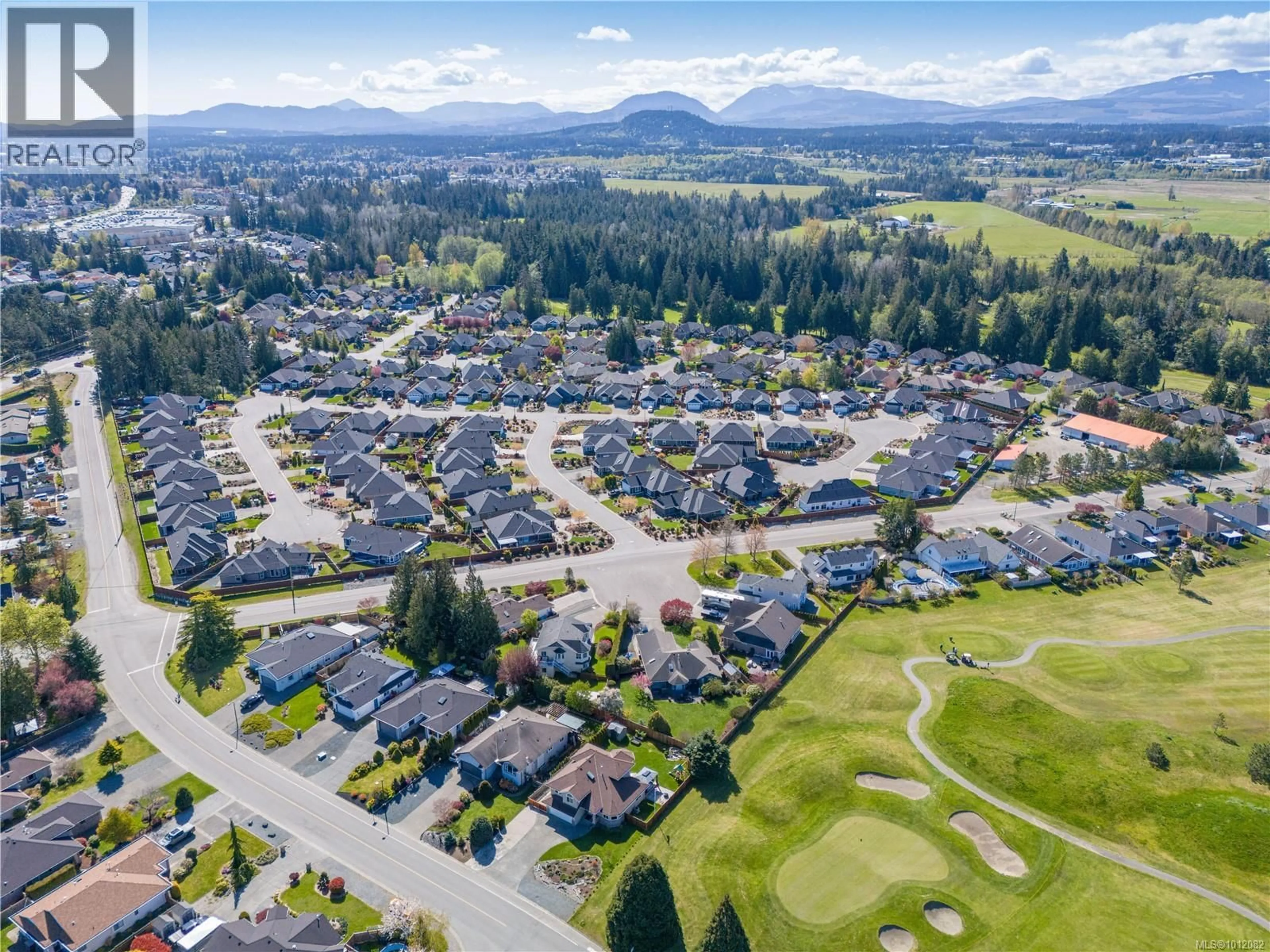 A pic from outside/outdoor area/front of a property/back of a property/a pic from drone, mountain view for 1072 ROBERTON BOULEVARD, Parksville British Columbia V9P2N9