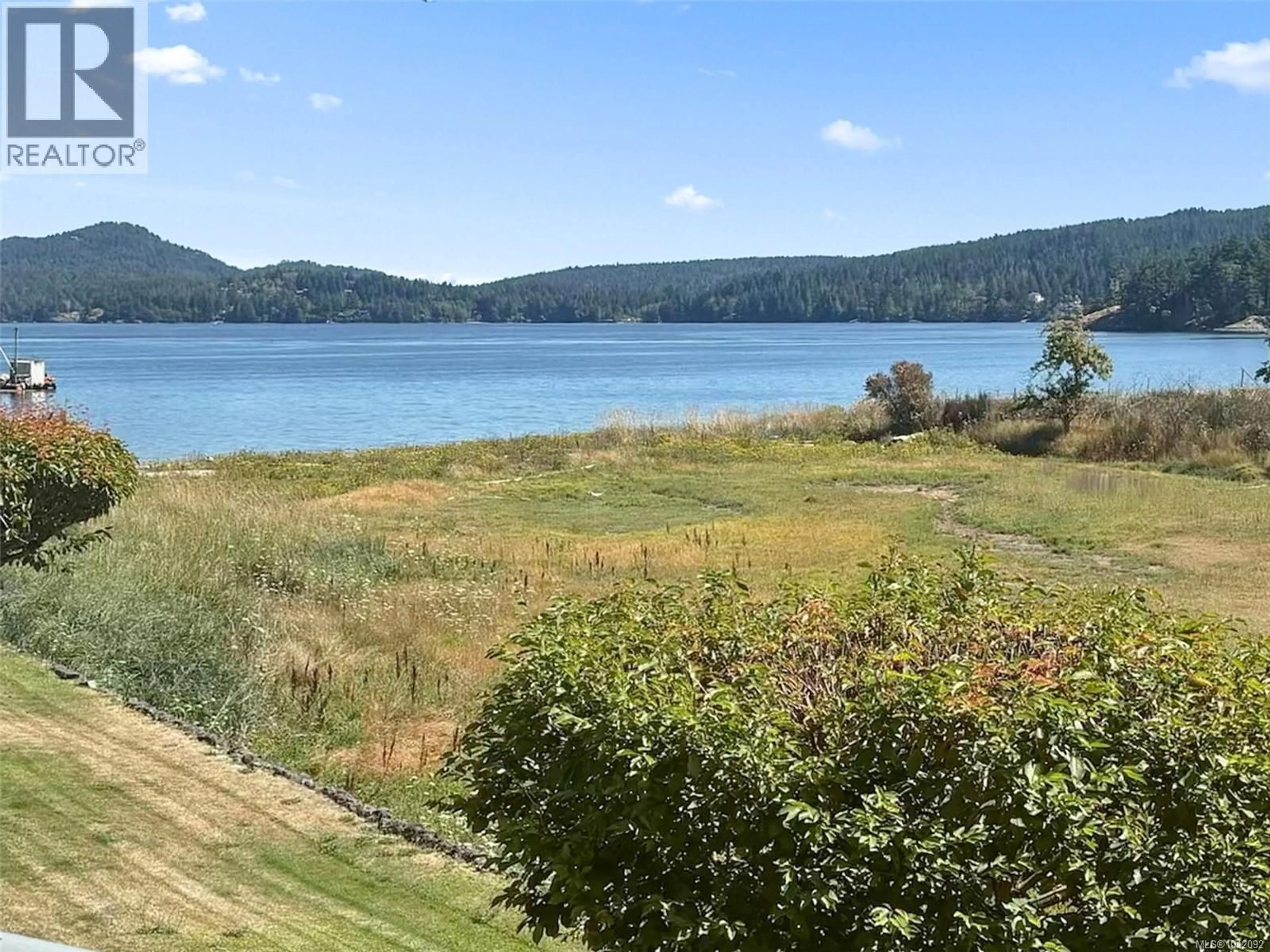 A pic from outside/outdoor area/front of a property/back of a property/a pic from drone, water/lake/river/ocean view for 11 - 6110 SEABROOM ROAD, Sooke British Columbia V9Z0B8