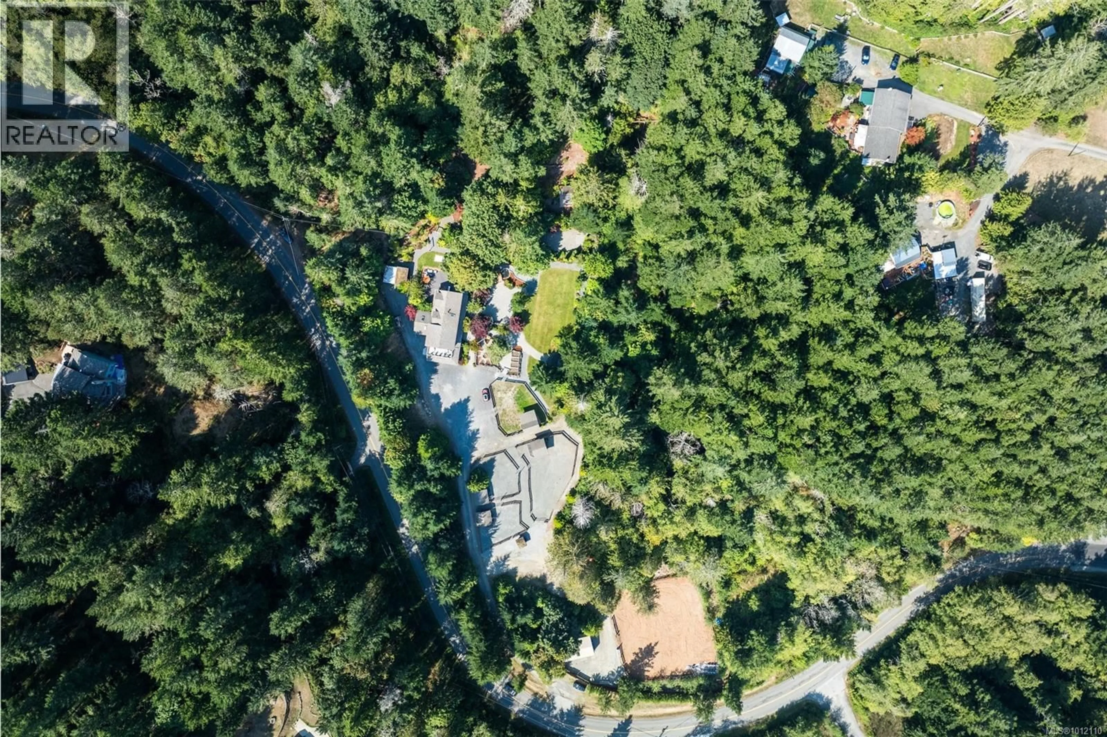 A pic from outside/outdoor area/front of a property/back of a property/a pic from drone, forest/trees view for 4466 LINDHOLM ROAD, Metchosin British Columbia V9C3Y1