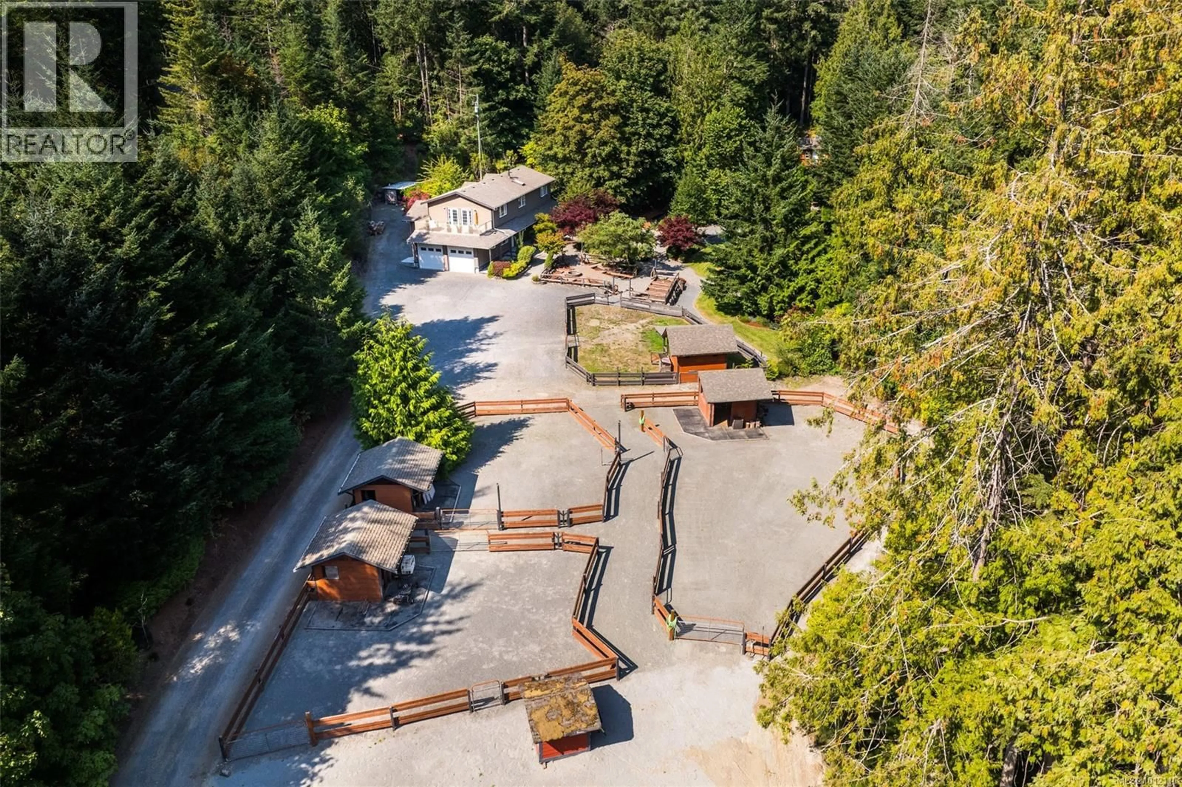 A pic from outside/outdoor area/front of a property/back of a property/a pic from drone, forest/trees view for 4466 LINDHOLM ROAD, Metchosin British Columbia V9C3Y1