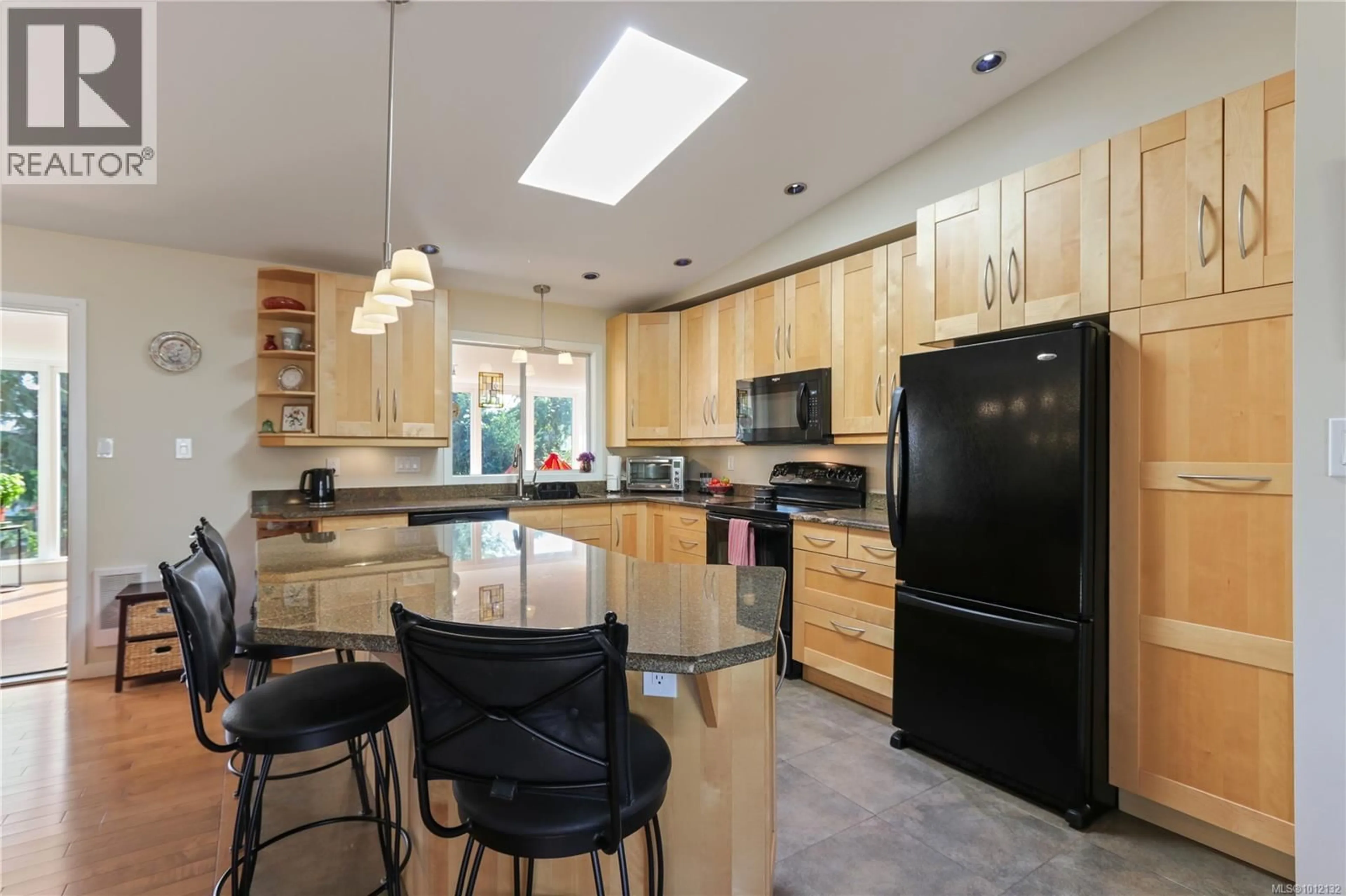 Open concept kitchen, ceramic/tile floor for 6378 INVERMERE ROAD, Nanaimo British Columbia V9V1B9