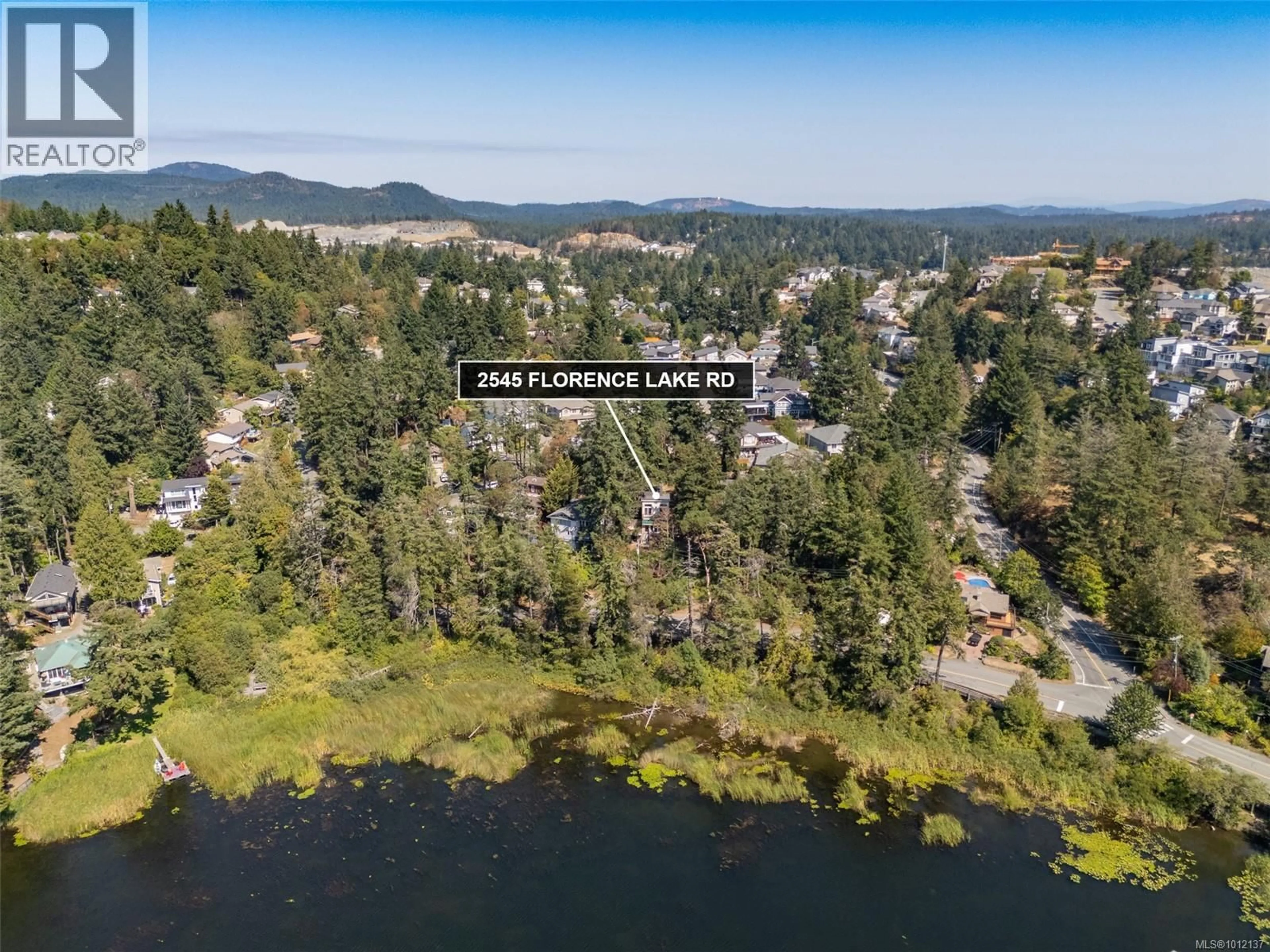 A pic from outside/outdoor area/front of a property/back of a property/a pic from drone, water/lake/river/ocean view for 2545 FLORENCE LAKE ROAD, Langford British Columbia V9B4H4