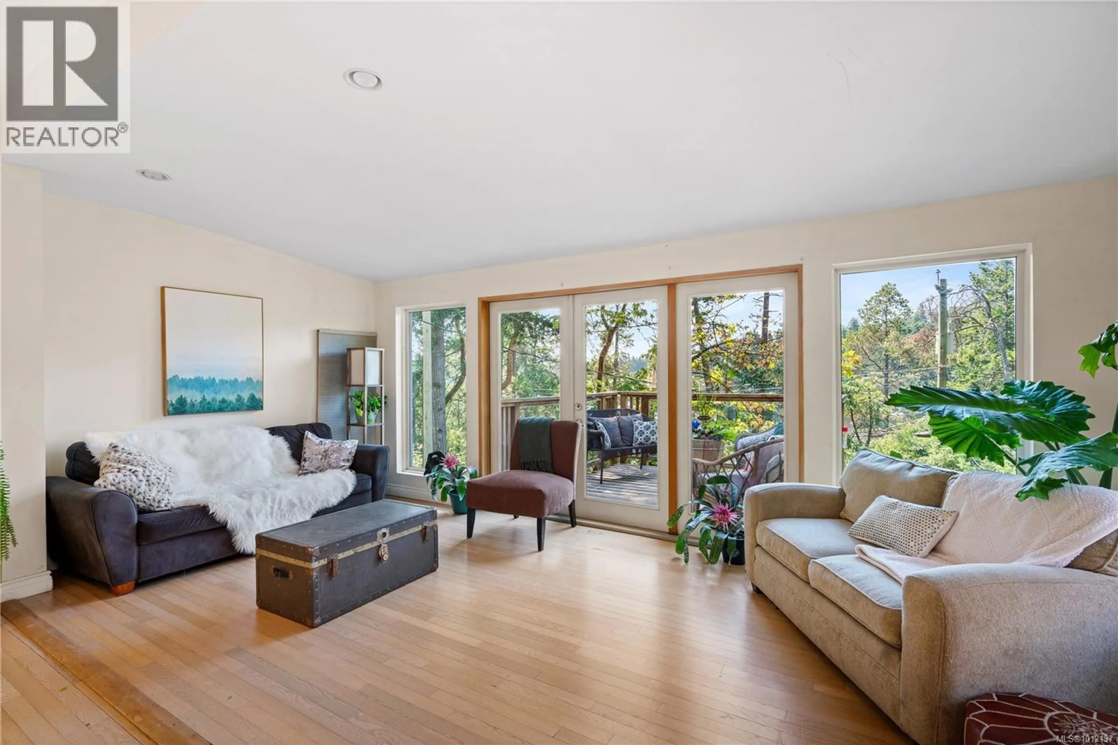 Living room with furniture, wood/laminate floor for 2545 FLORENCE LAKE ROAD, Langford British Columbia V9B4H4