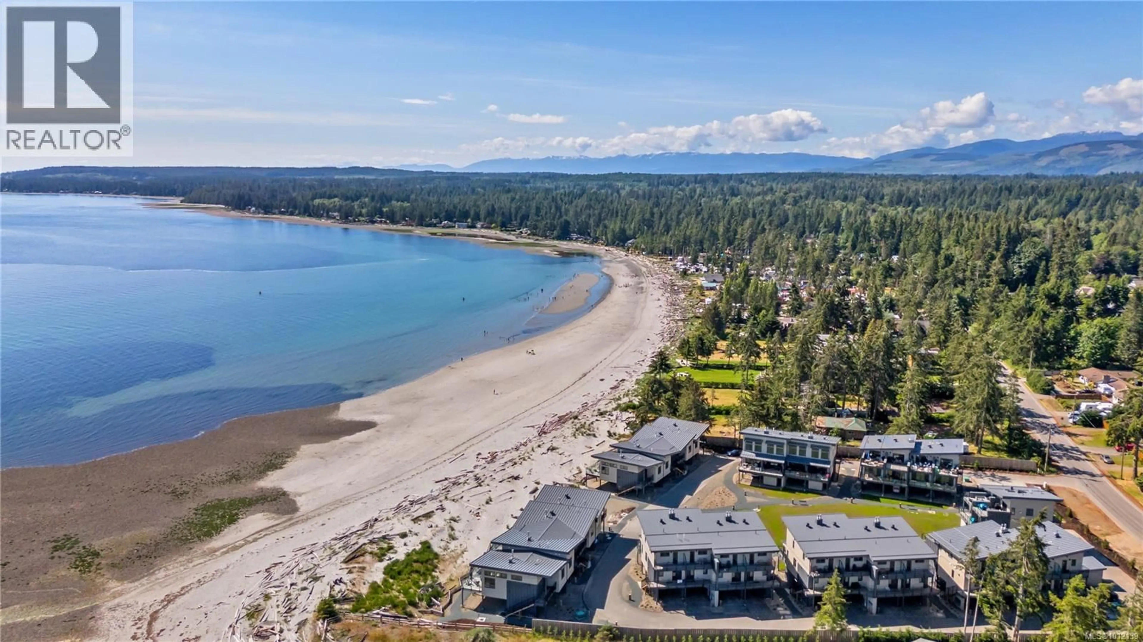 A pic from outside/outdoor area/front of a property/back of a property/a pic from drone, water/lake/river/ocean view for 19 - 9022 CLARKSON AVENUE, Black Creek British Columbia V9J1B3