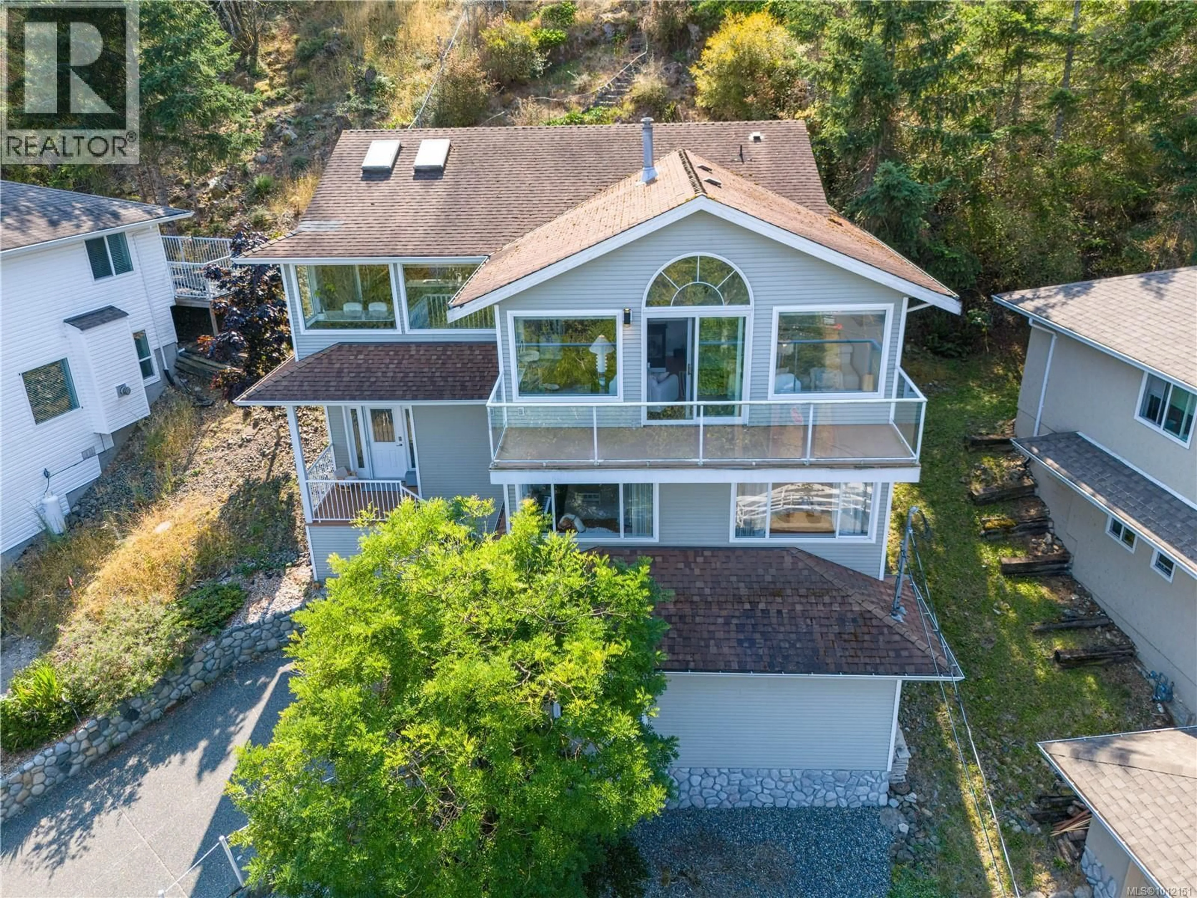 A pic from outside/outdoor area/front of a property/back of a property/a pic from drone, water/lake/river/ocean view for 4895 LAGUNA WAY, Nanaimo British Columbia V9T5C2