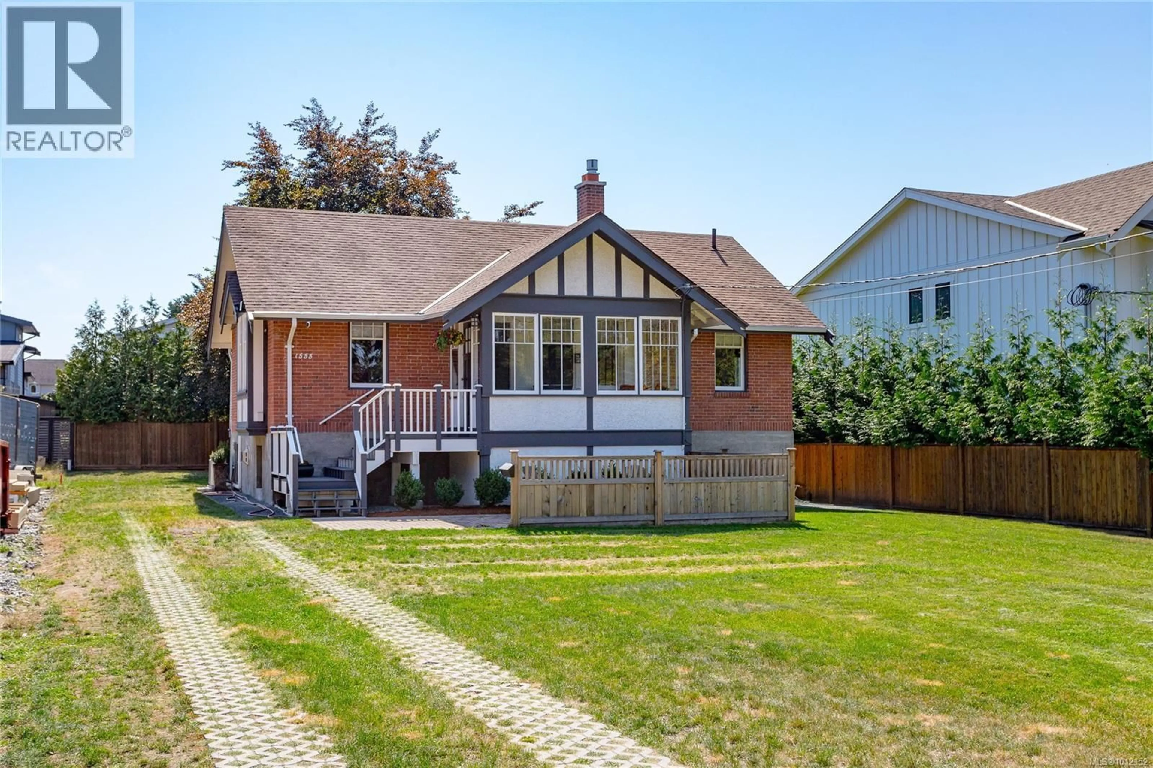 Home with brick exterior material, street for 1555 ASH ROAD, Saanich British Columbia V8N2S9