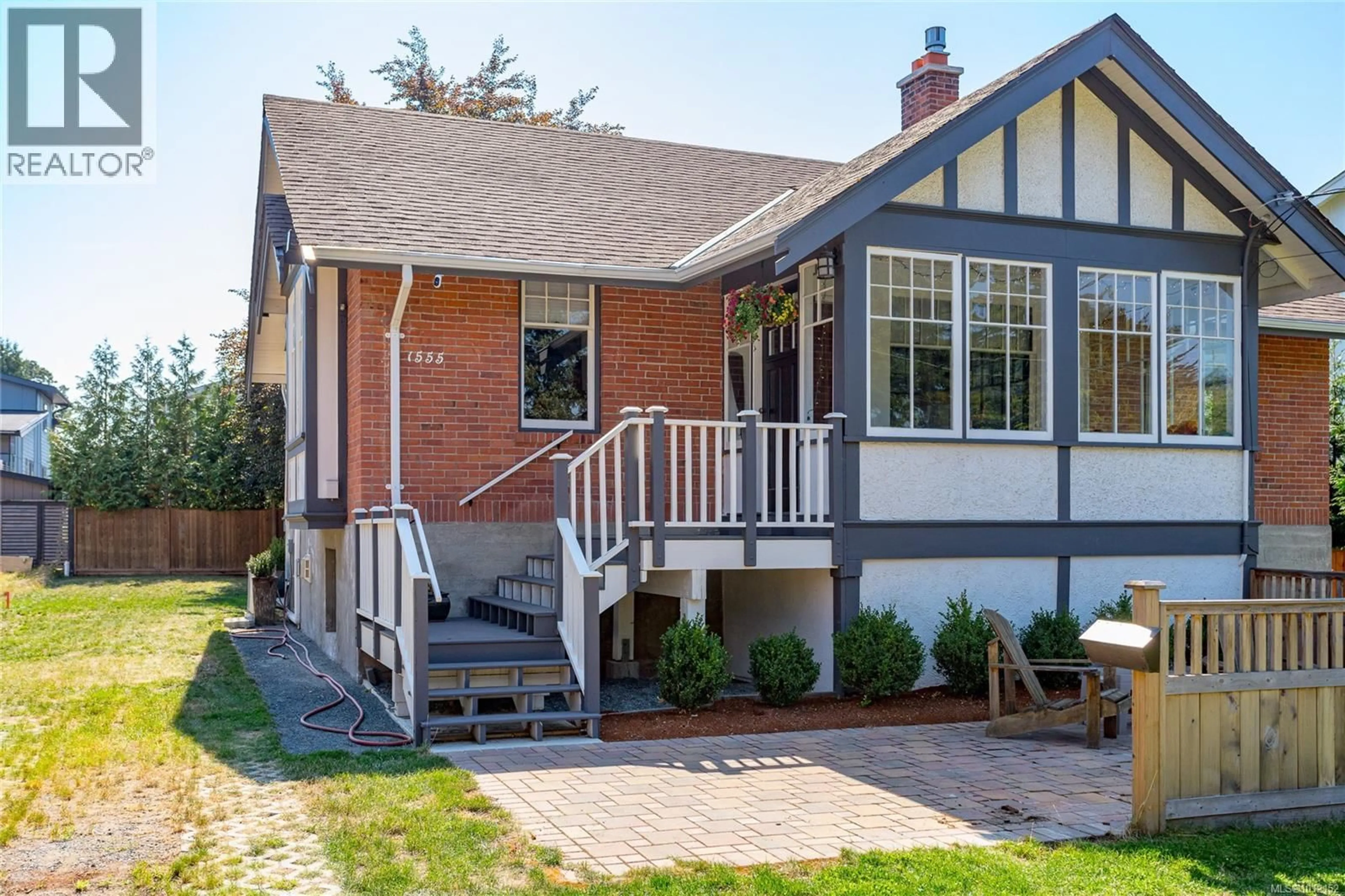 Home with brick exterior material, street for 1555 ASH ROAD, Saanich British Columbia V8N2S9