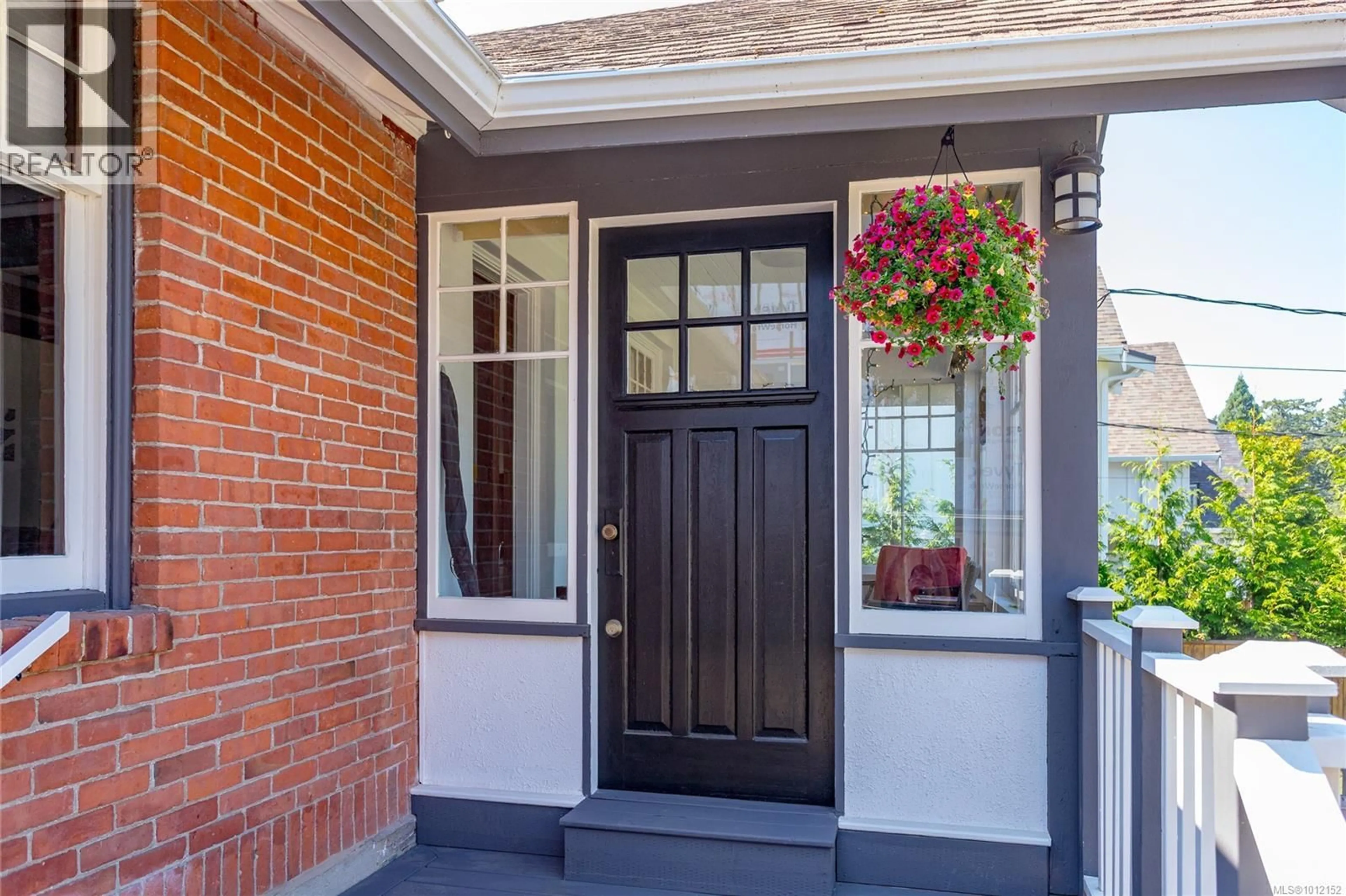 Home with brick exterior material, street for 1555 ASH ROAD, Saanich British Columbia V8N2S9