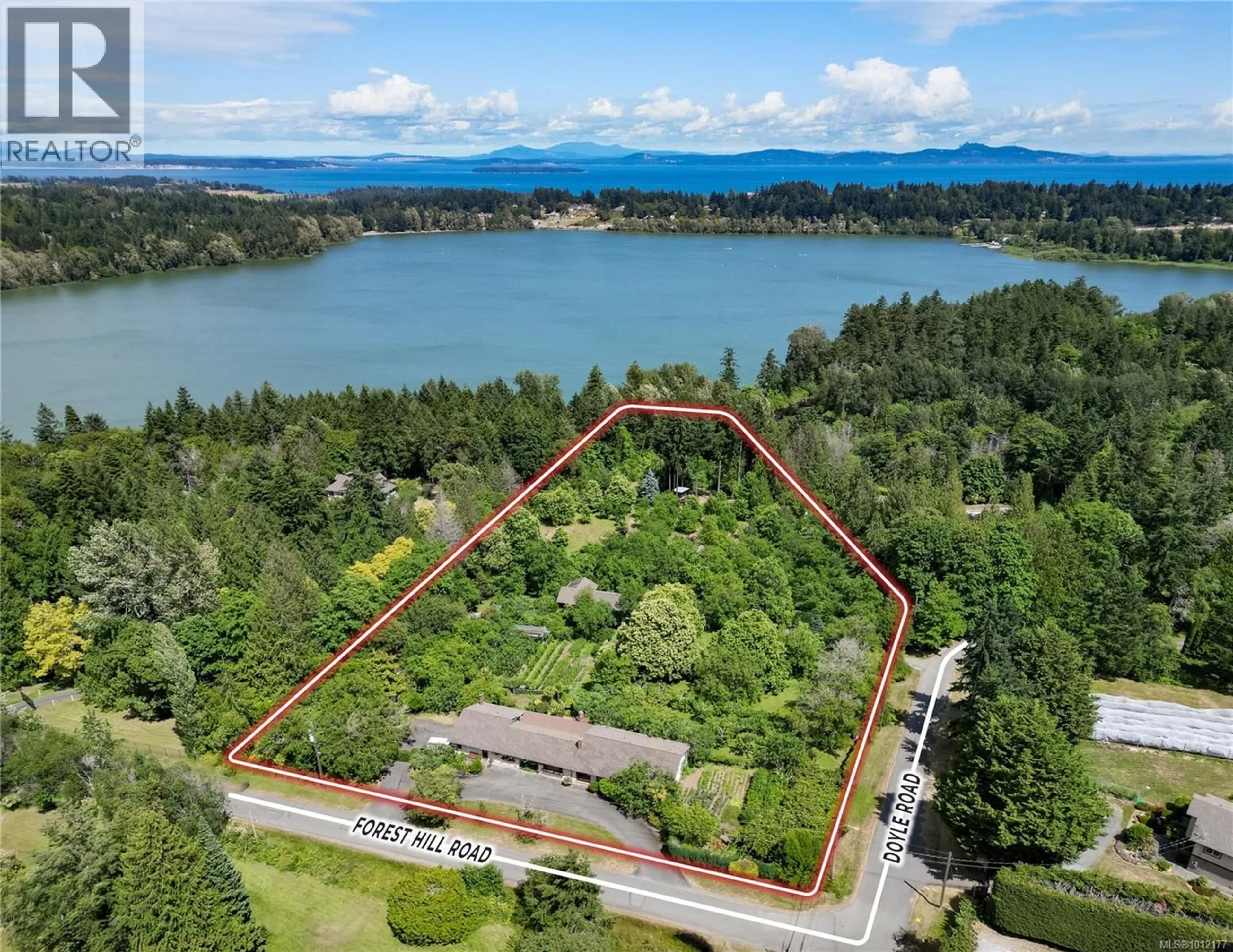 A pic from outside/outdoor area/front of a property/back of a property/a pic from drone, water/lake/river/ocean view for 5489 FOREST HILL ROAD, Saanich British Columbia V9E2A8