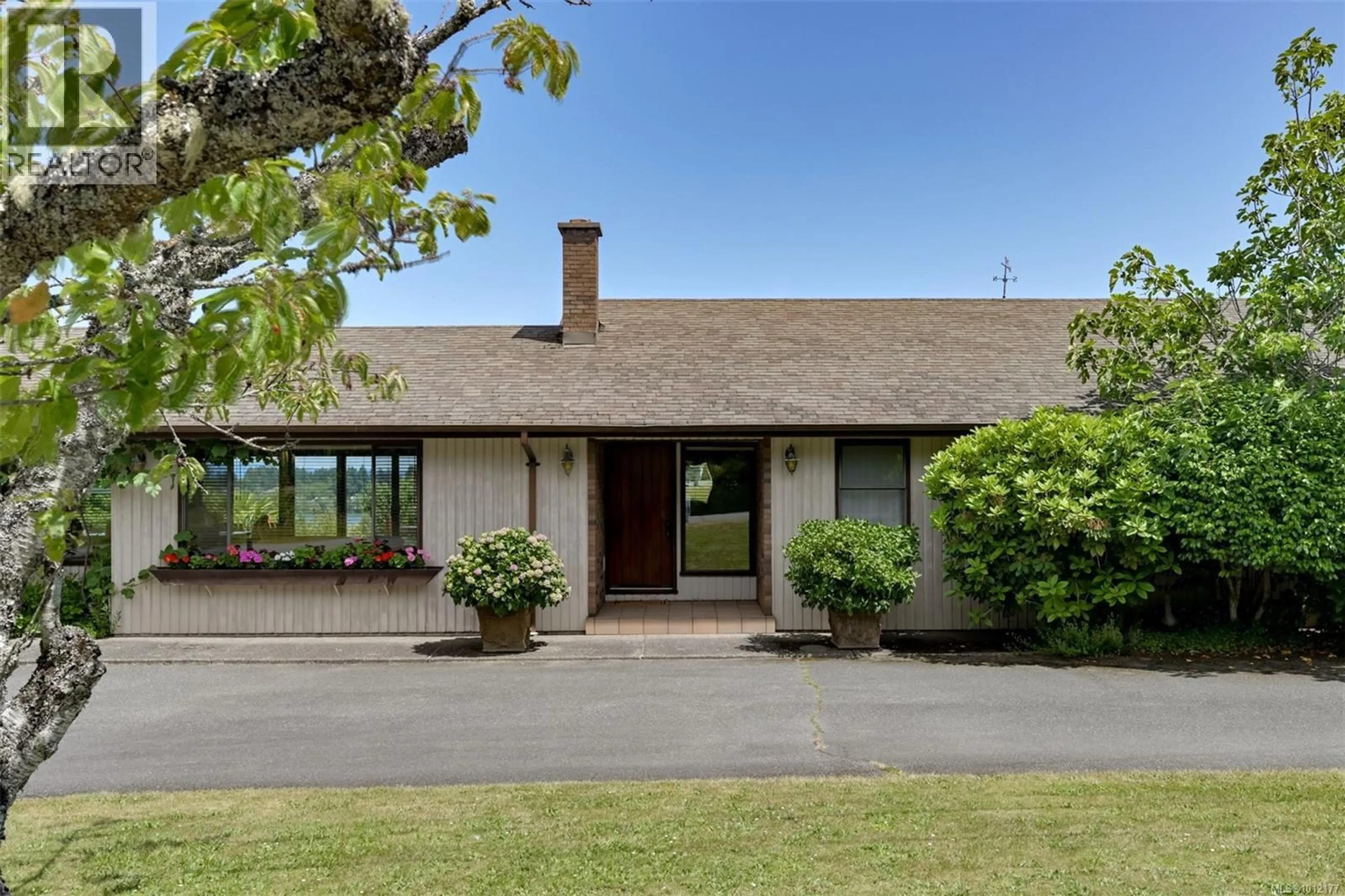 A pic from outside/outdoor area/front of a property/back of a property/a pic from drone, unknown for 5489 FOREST HILL ROAD, Saanich British Columbia V9E2A8