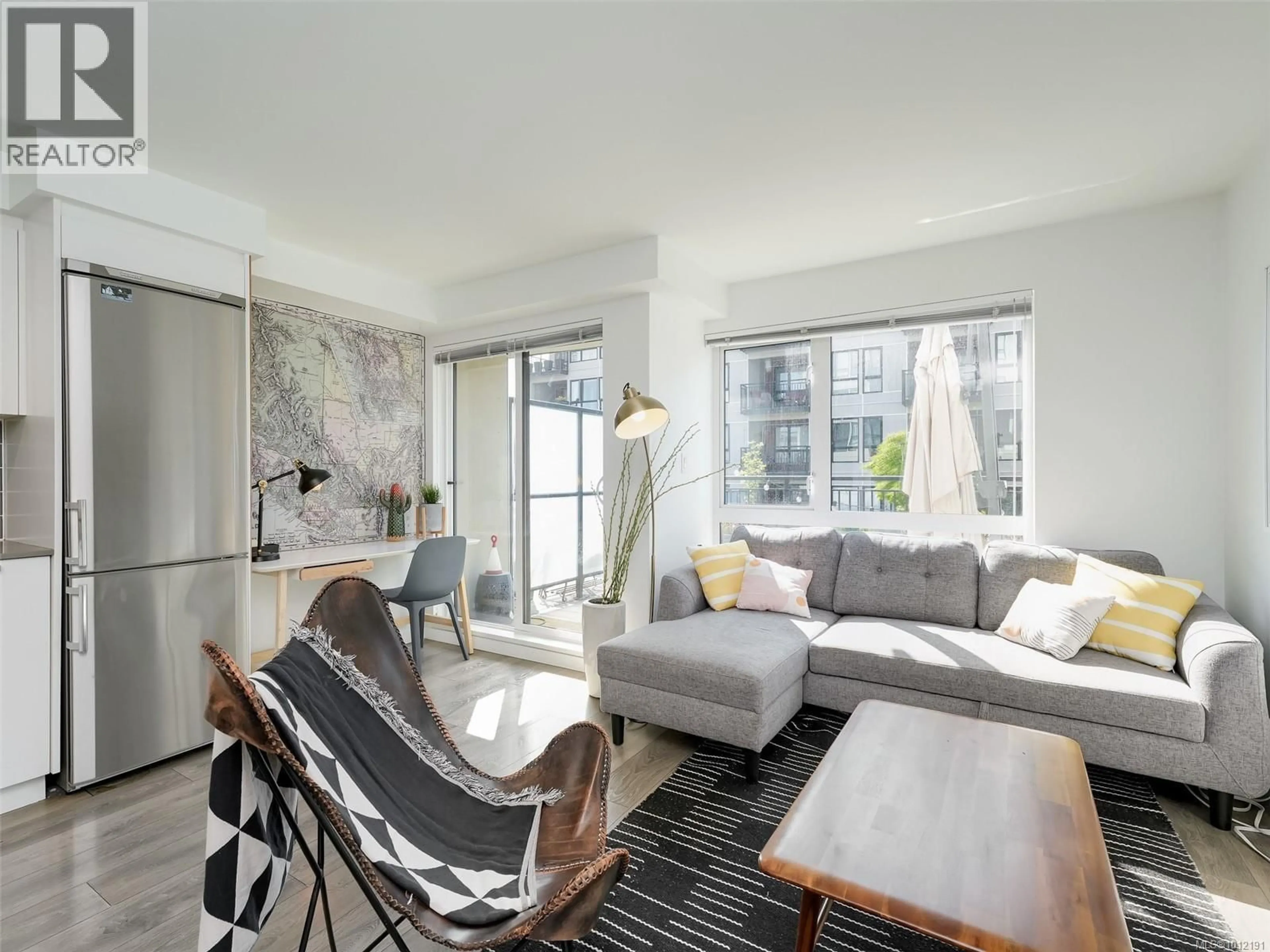 Living room with furniture, unknown for 215 - 517 FISGARD STREET, Victoria British Columbia V8W0C5