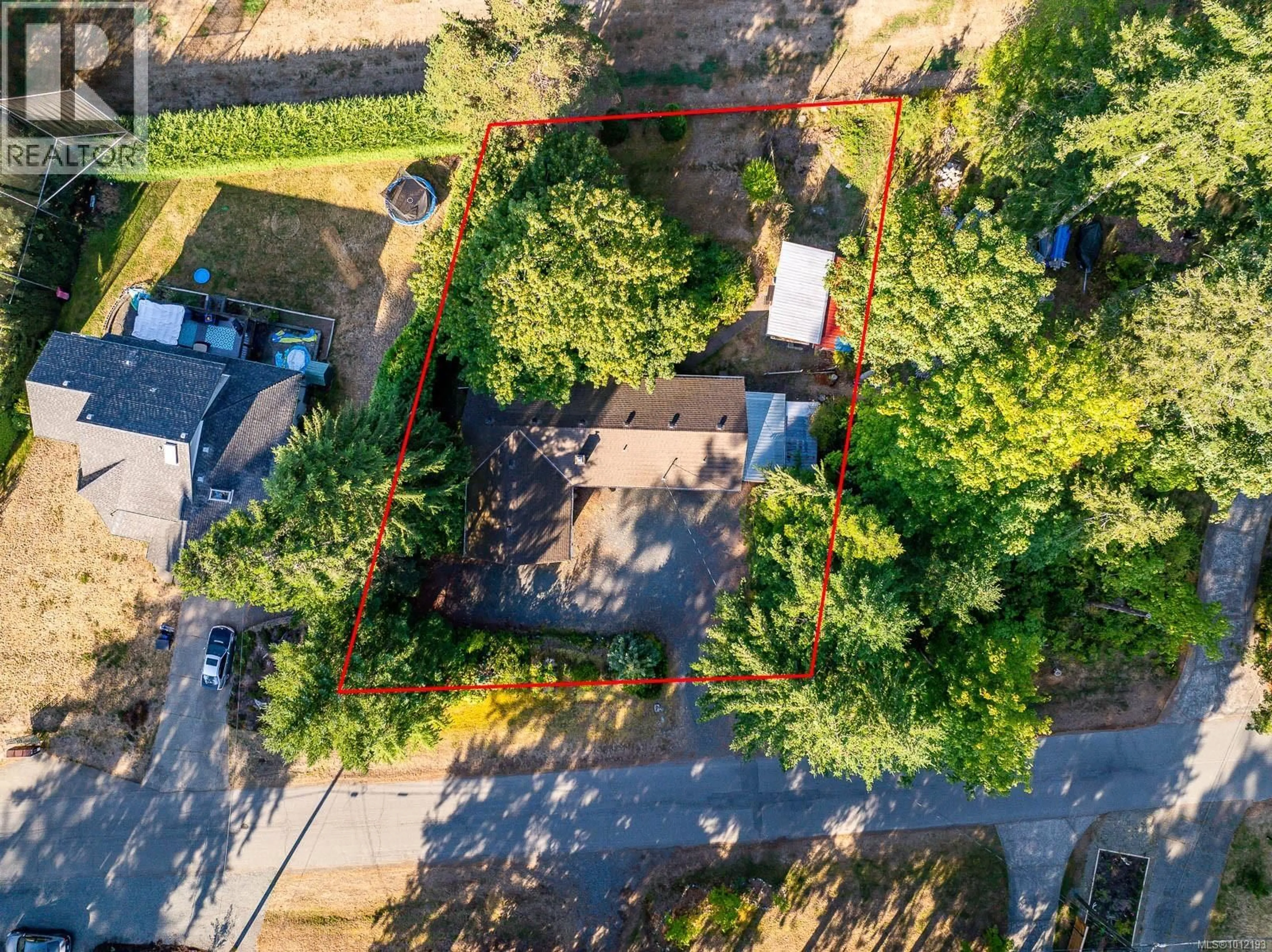 A pic from outside/outdoor area/front of a property/back of a property/a pic from drone, street for 8837 HENDERSON AVENUE, Black Creek British Columbia V9J1A6