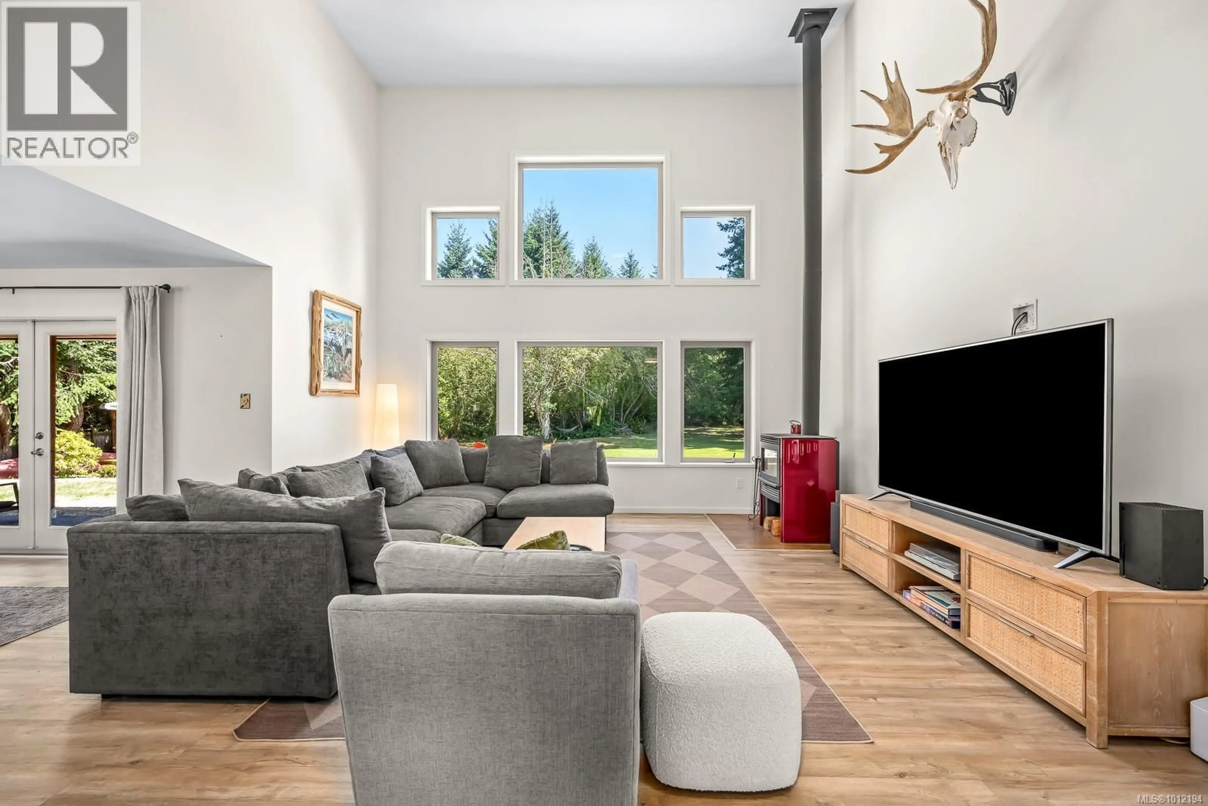 Living room with furniture, unknown for 1818 LITTLE RIVER ROAD, Comox British Columbia V9M4B9
