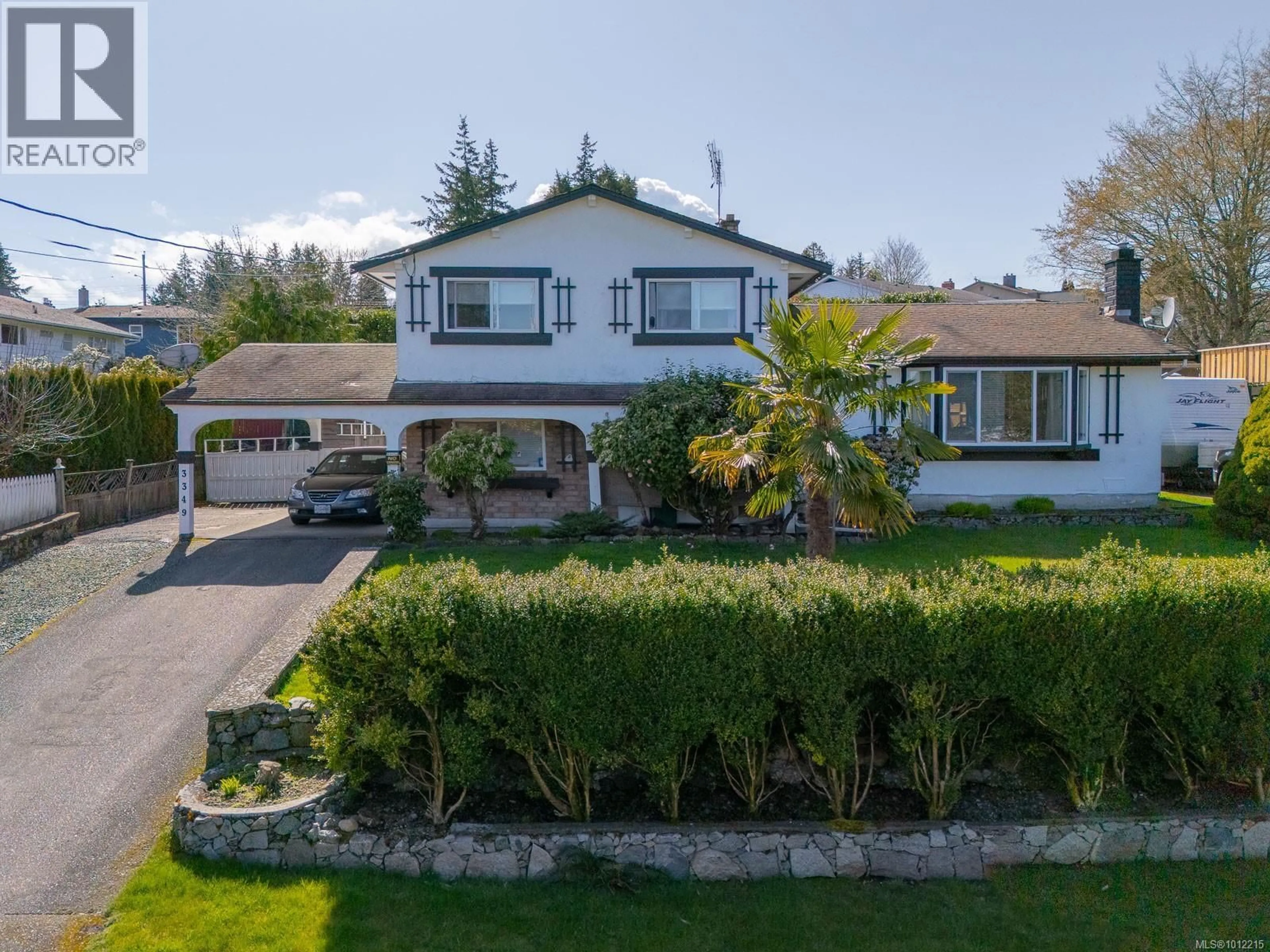 A pic from outside/outdoor area/front of a property/back of a property/a pic from drone, street for 3349 COUNTRY CLUB DRIVE, Nanaimo British Columbia V9T3B5