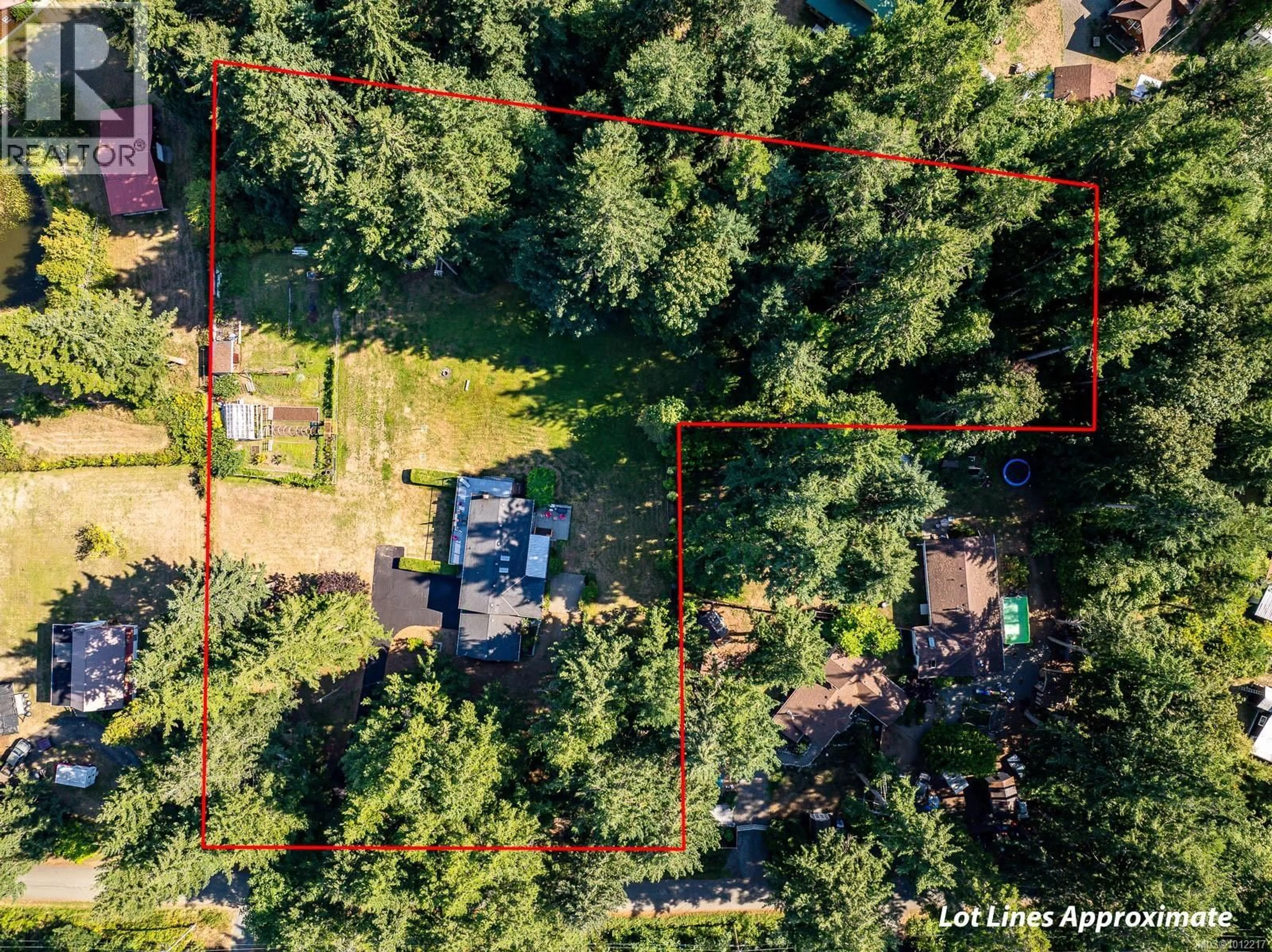 A pic from outside/outdoor area/front of a property/back of a property/a pic from drone, forest/trees view for 1927 WILSON ROAD, Courtenay British Columbia V9J1V6