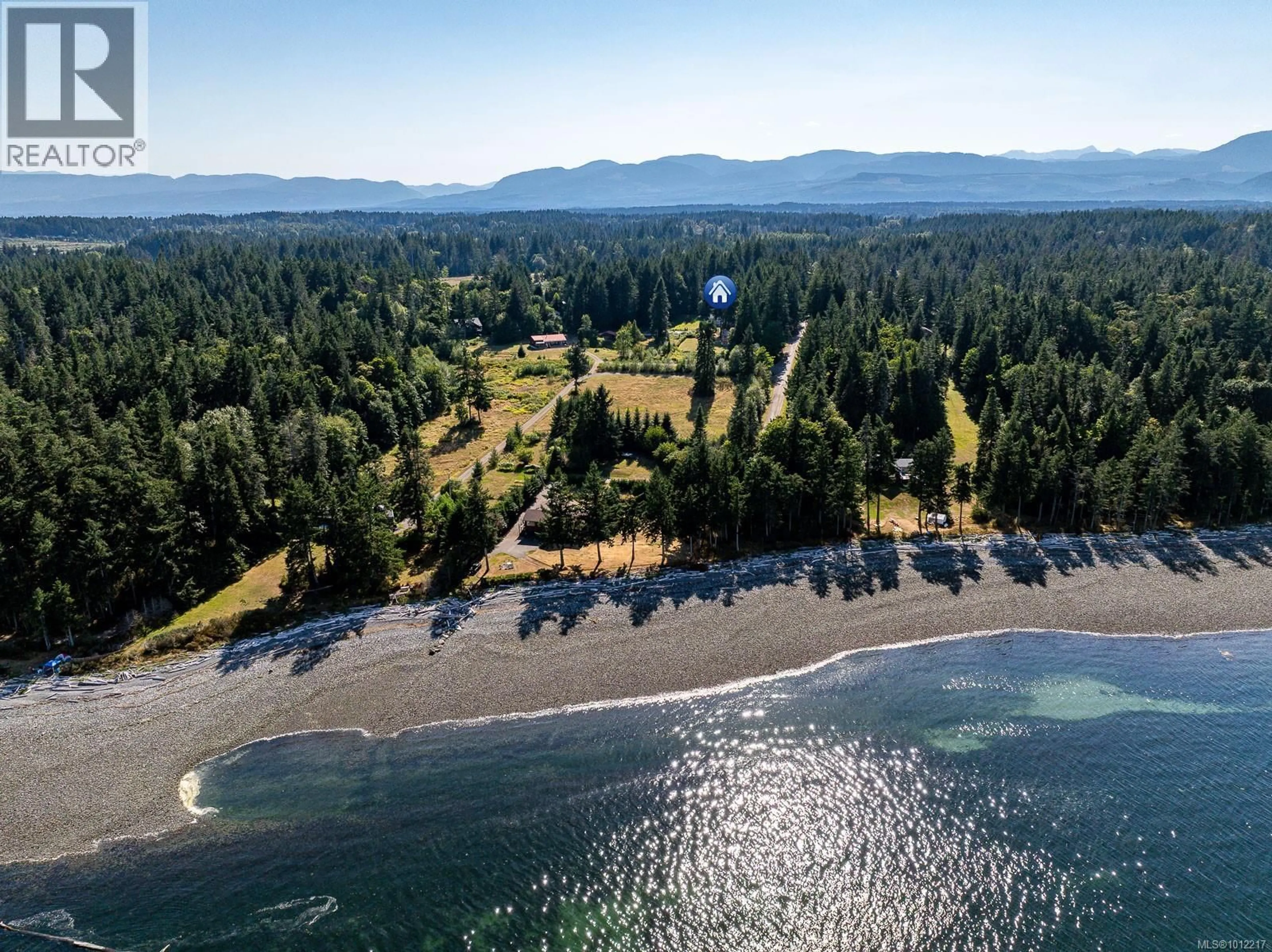 A pic from outside/outdoor area/front of a property/back of a property/a pic from drone, water/lake/river/ocean view for 1927 WILSON ROAD, Courtenay British Columbia V9J1V6