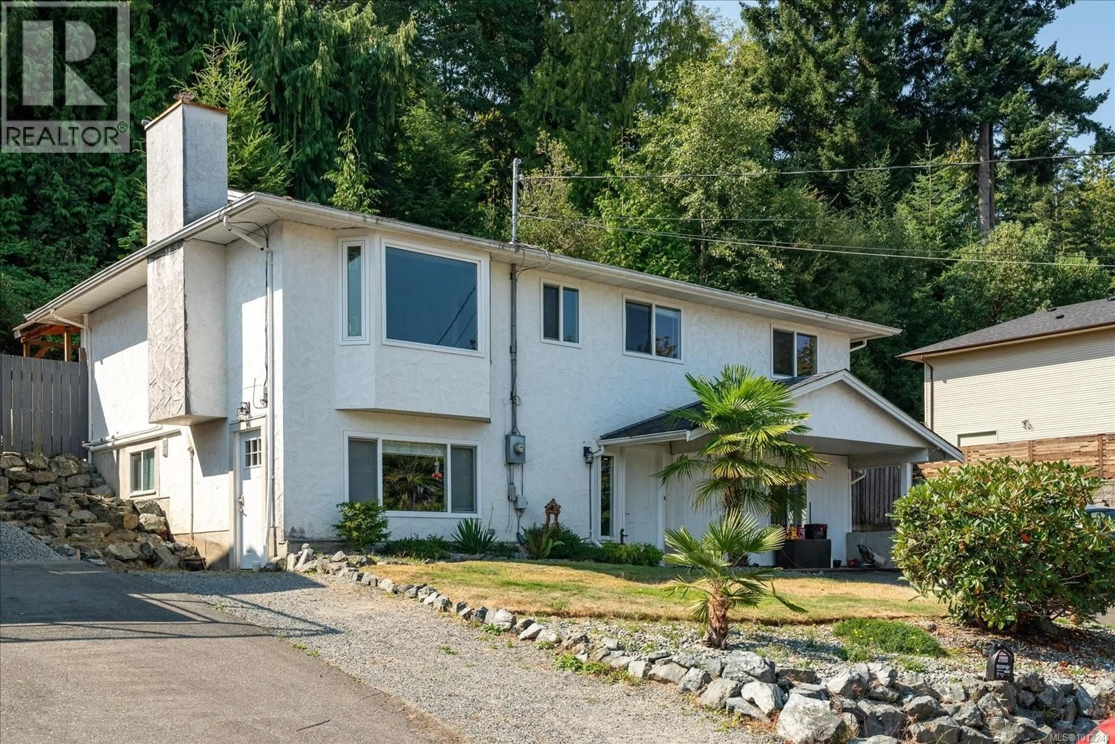 Home with vinyl exterior material, street for 5241 TOMS TURNABOUT, Nanaimo British Columbia V9T5M9