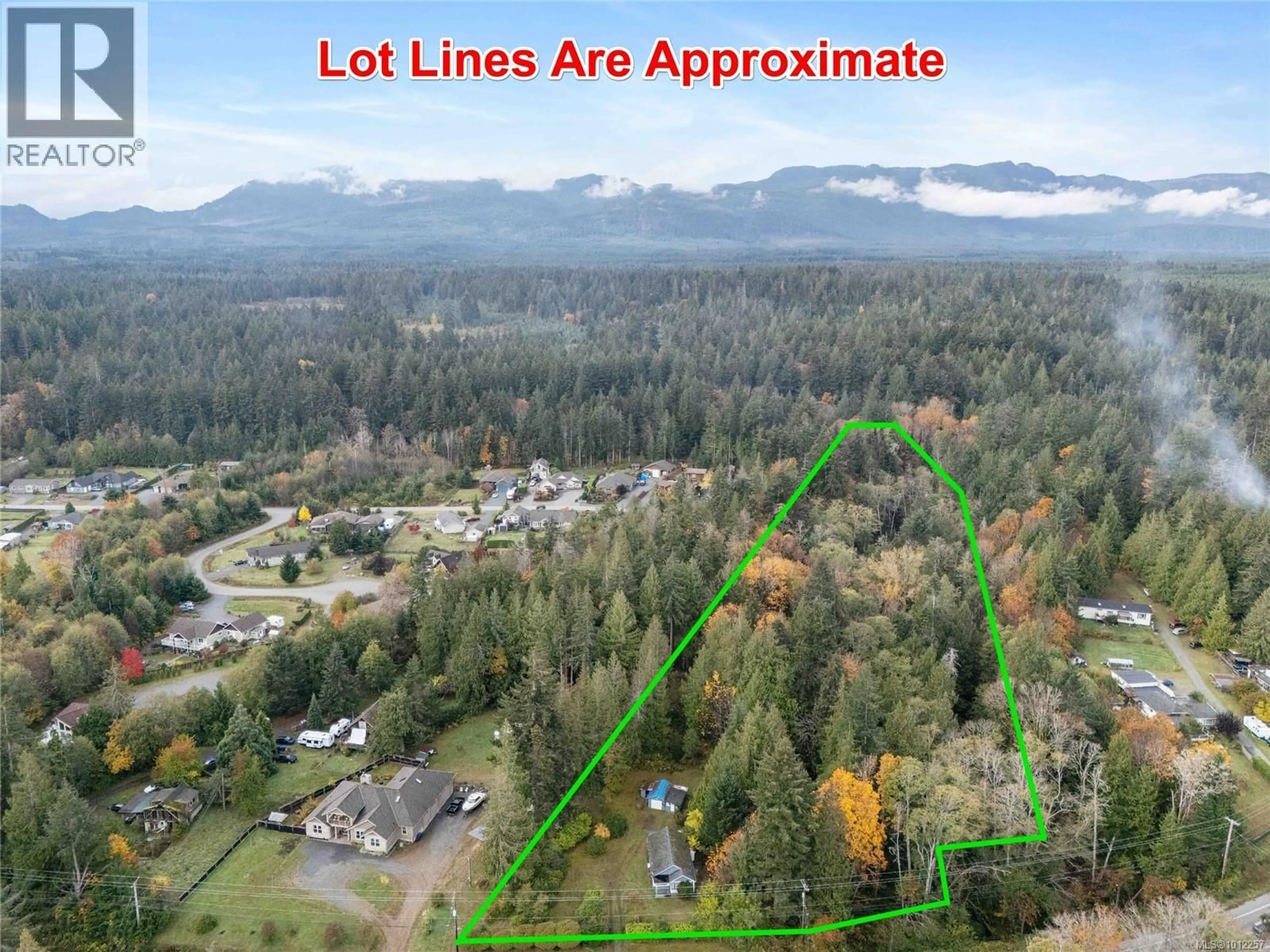 A pic from outside/outdoor area/front of a property/back of a property/a pic from drone, forest/trees view for 6850 ISLAND HIGHWAY WEST, Bowser British Columbia V0R1G0
