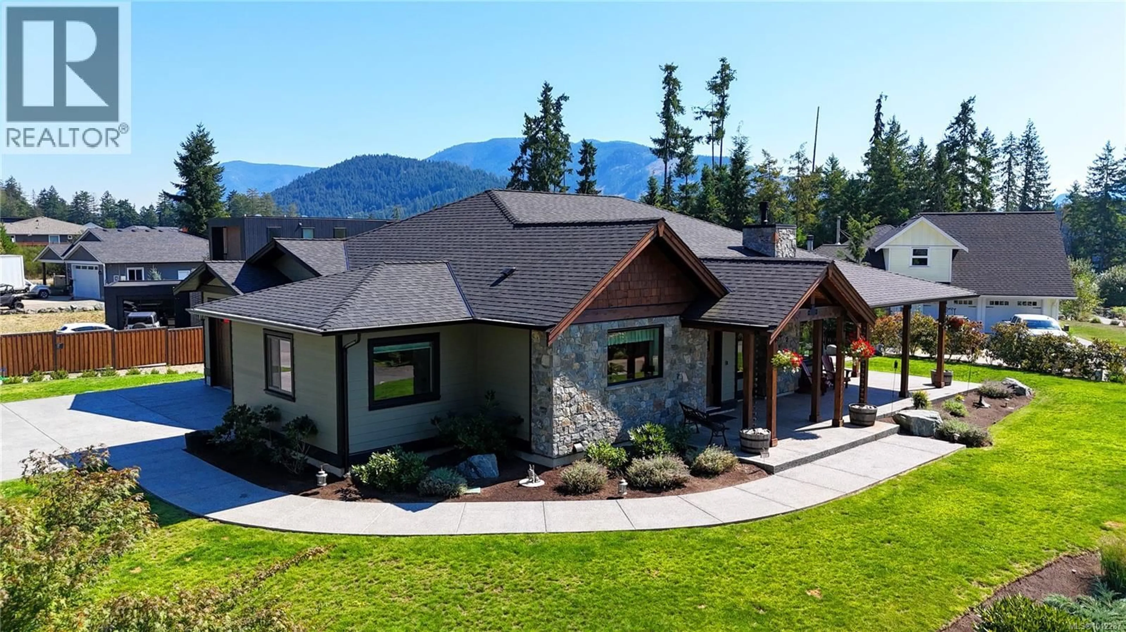 A pic from outside/outdoor area/front of a property/back of a property/a pic from drone, mountain view for 7375 LAKEFRONT DRIVE, Lake Cowichan British Columbia V0R2G1