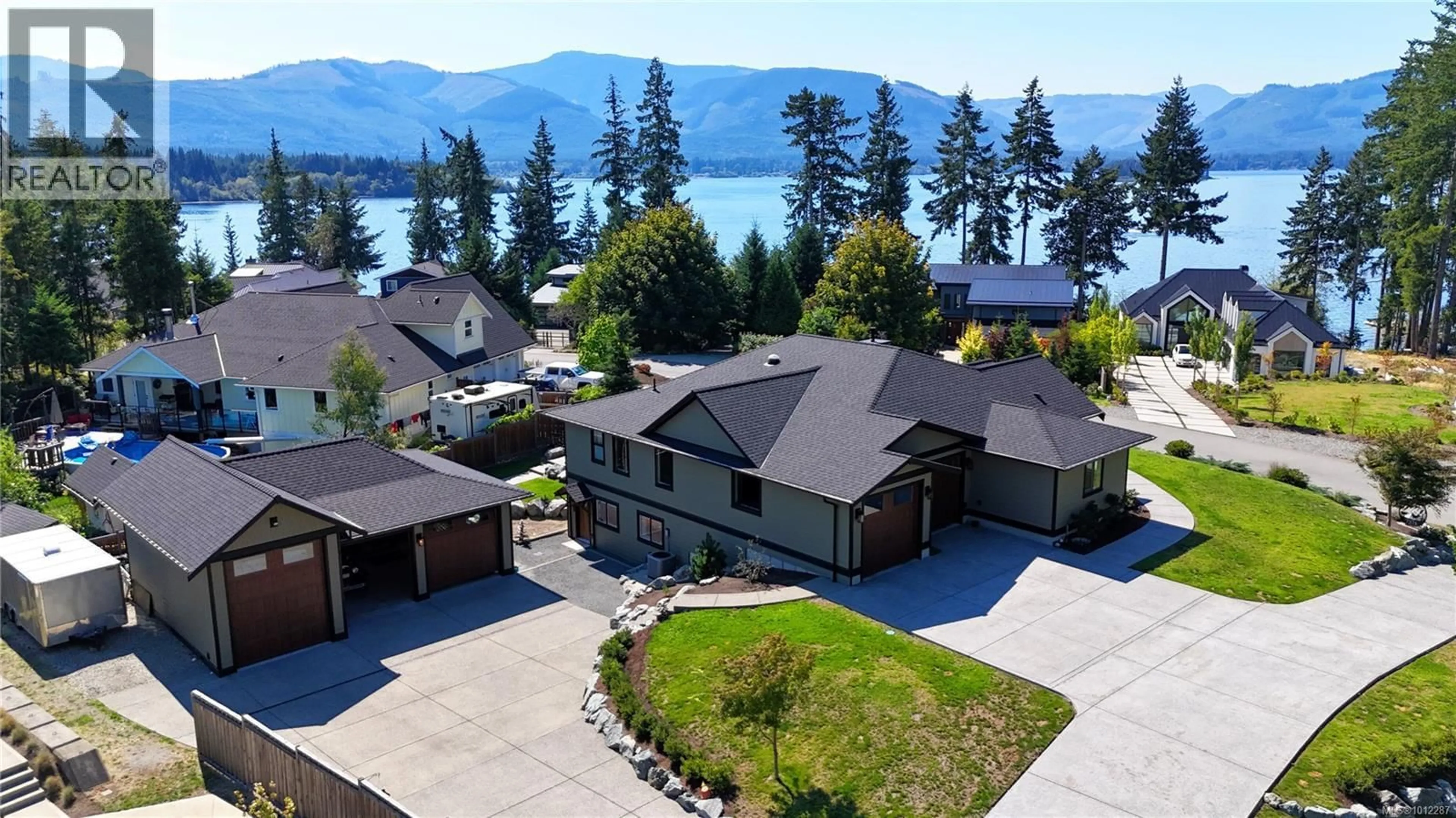 A pic from outside/outdoor area/front of a property/back of a property/a pic from drone, water/lake/river/ocean view for 7375 LAKEFRONT DRIVE, Lake Cowichan British Columbia V0R2G1