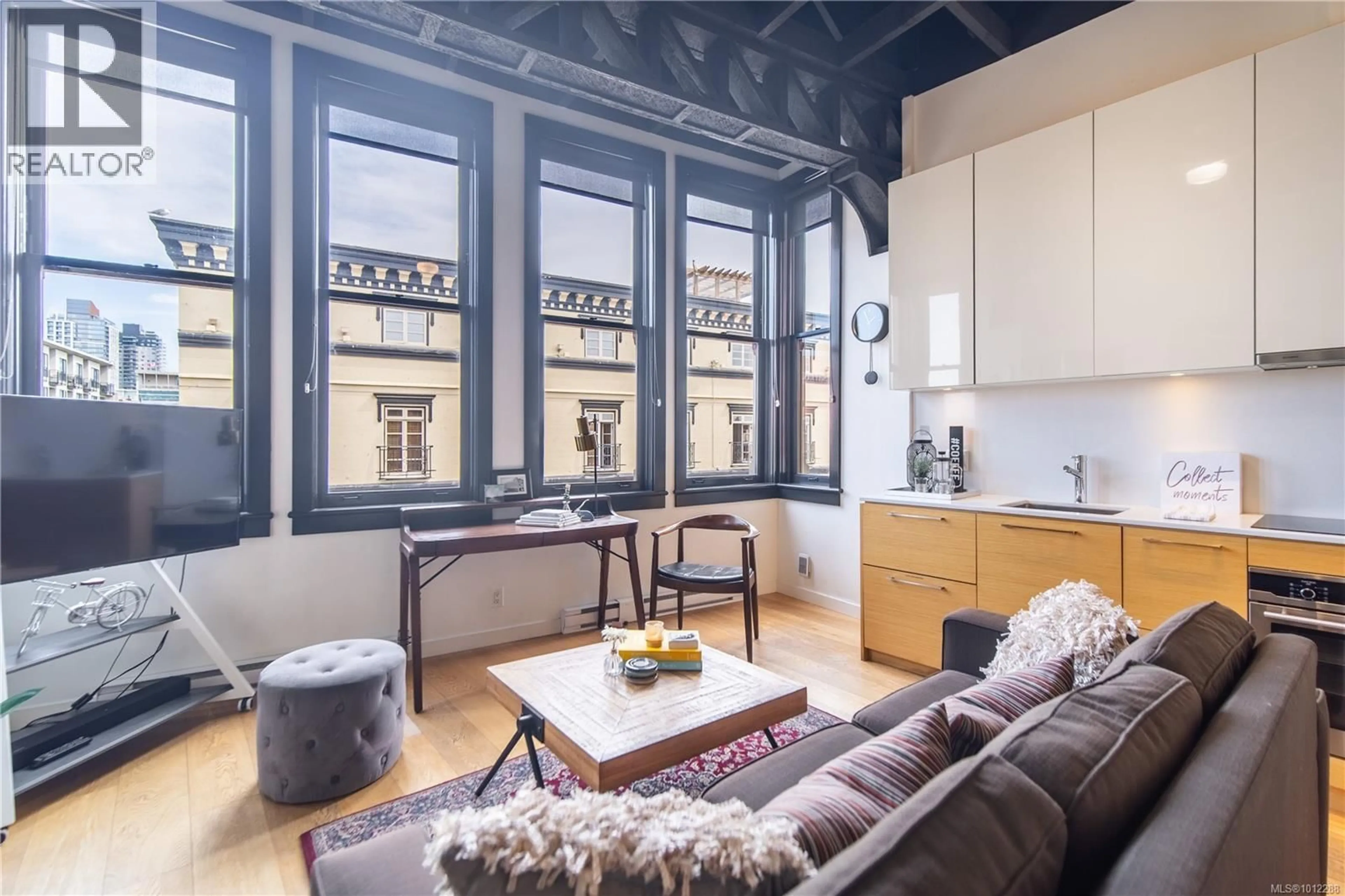 Living room with furniture, cement floor for 327 - 1610 STORE STREET, Victoria British Columbia V8W0E3