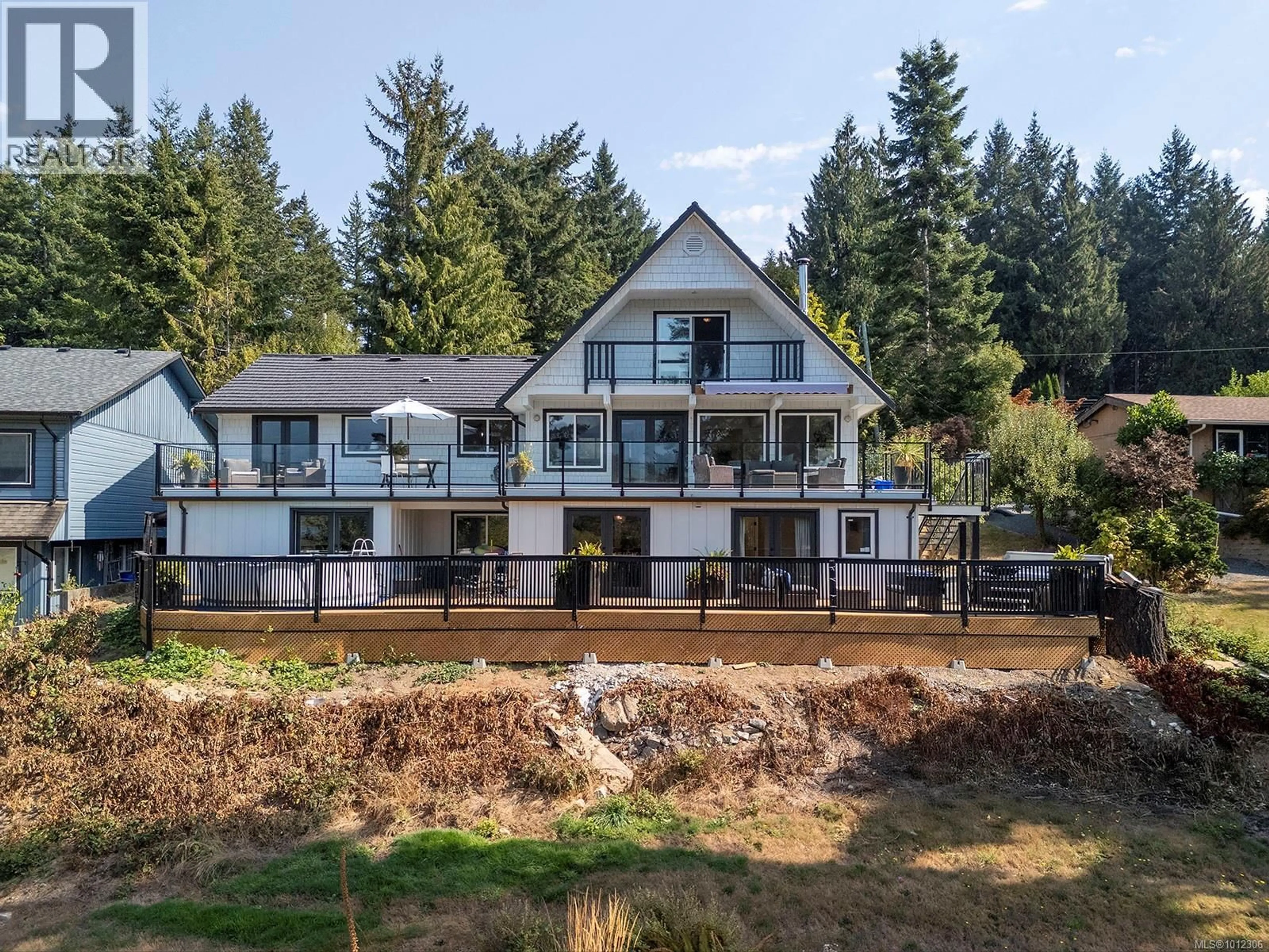 A pic from outside/outdoor area/front of a property/back of a property/a pic from drone, water/lake/river/ocean view for 7703 TOZER ROAD, Fanny Bay British Columbia V0R1W0