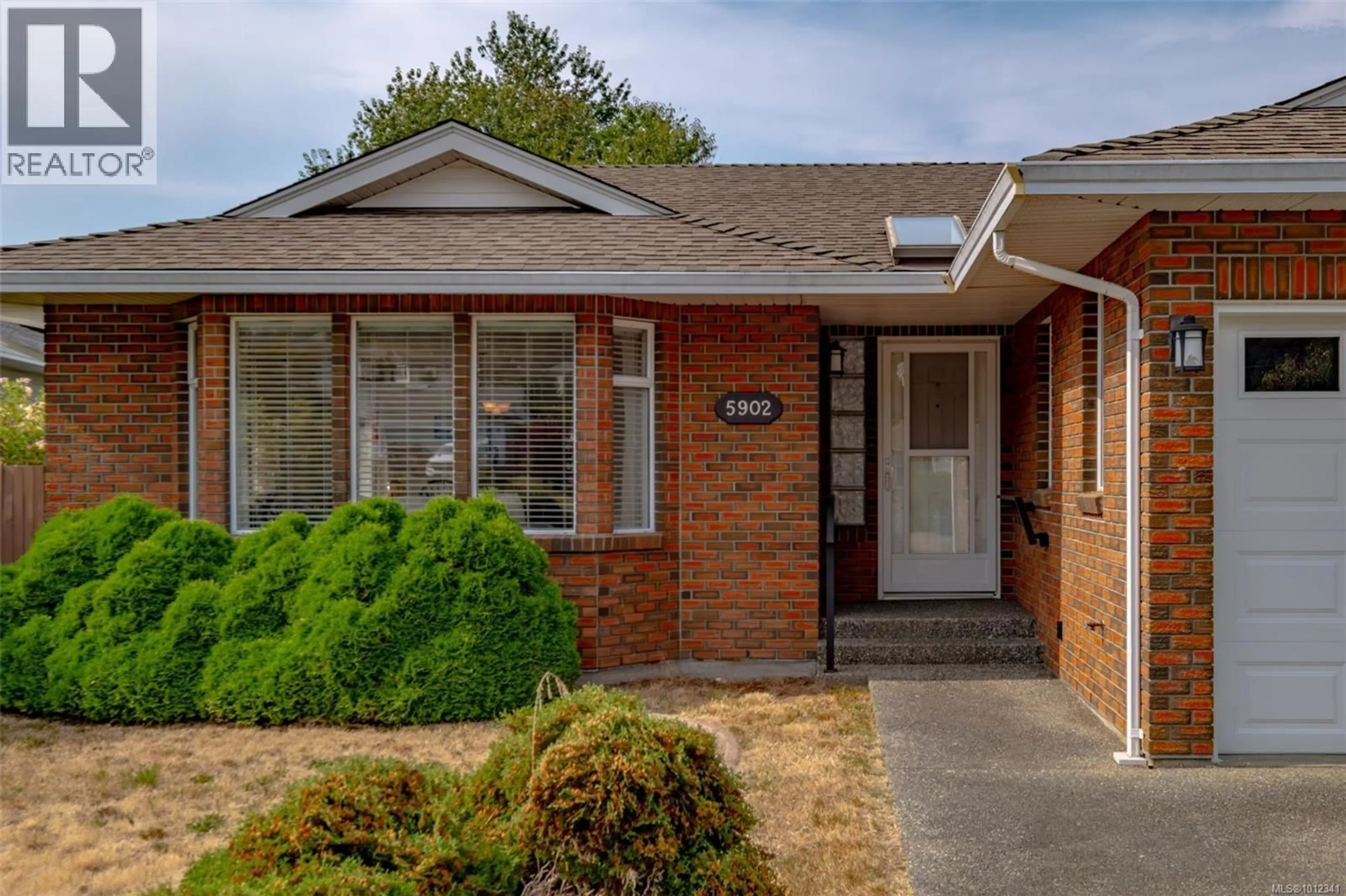 Home with brick exterior material, street for 5902 BEACON PLACE, Nanaimo British Columbia V9V1J6