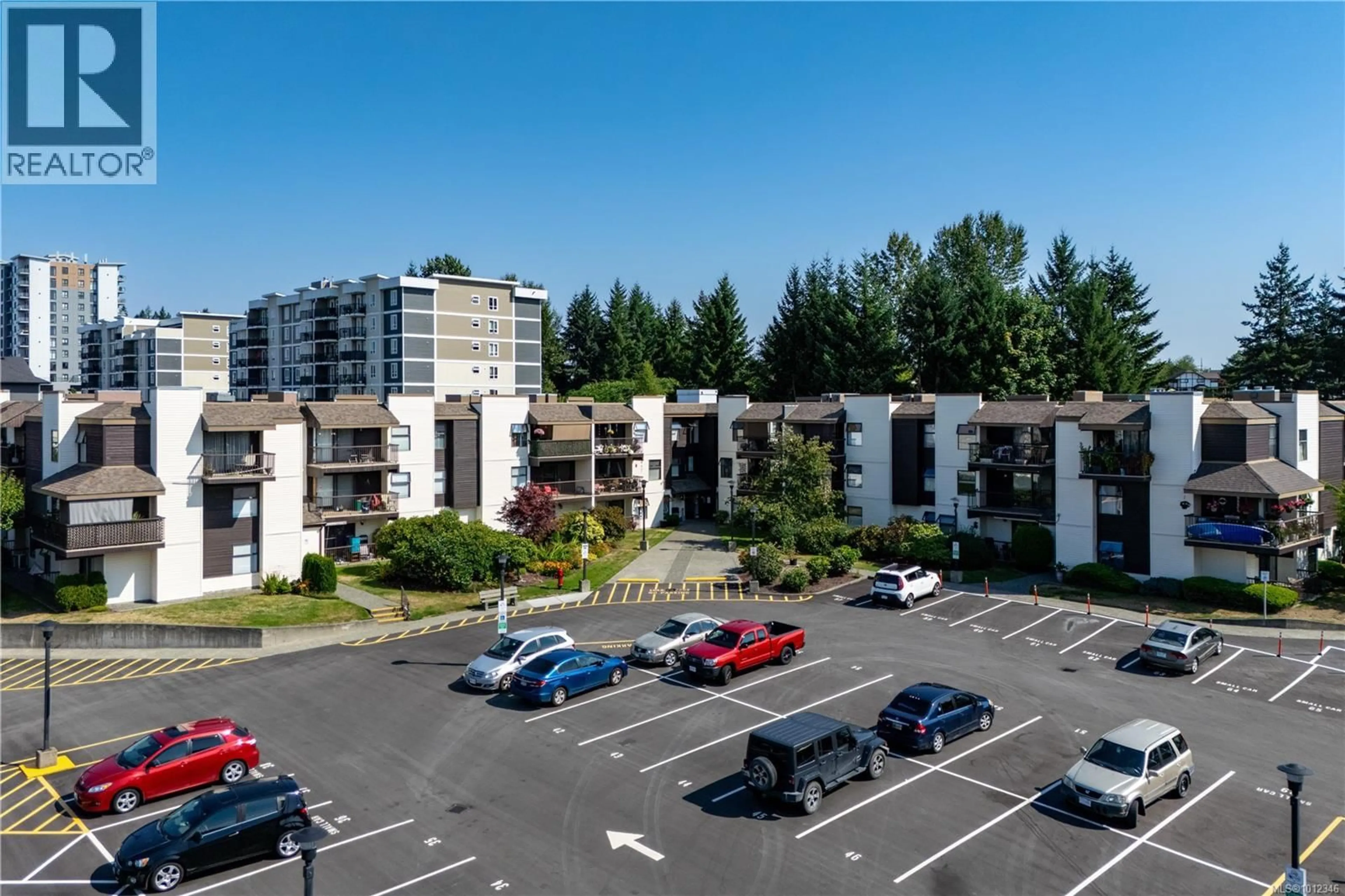 A pic from outside/outdoor area/front of a property/back of a property/a pic from drone, mountain view for 306 - 585 DOGWOOD STREET SOUTH, Campbell River British Columbia V9W6T6