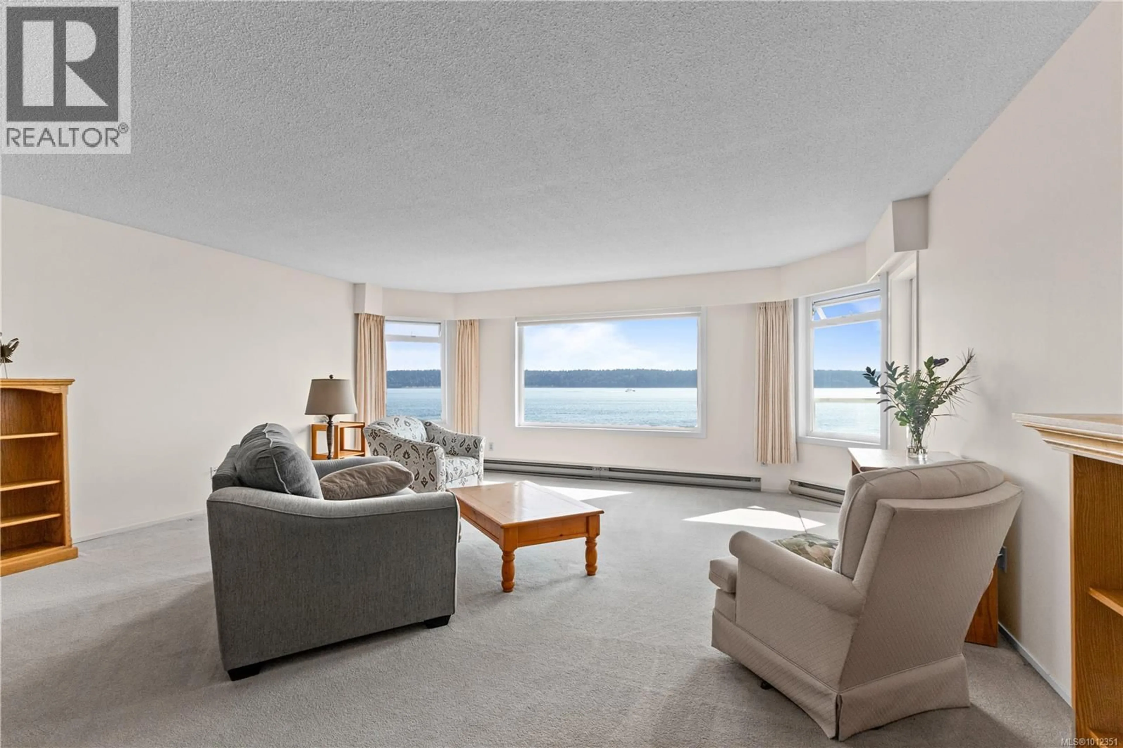 Living room with furniture, unknown for 406 - 169 ISLAND HIGHWAY SOUTH, Campbell River British Columbia V9W6W2