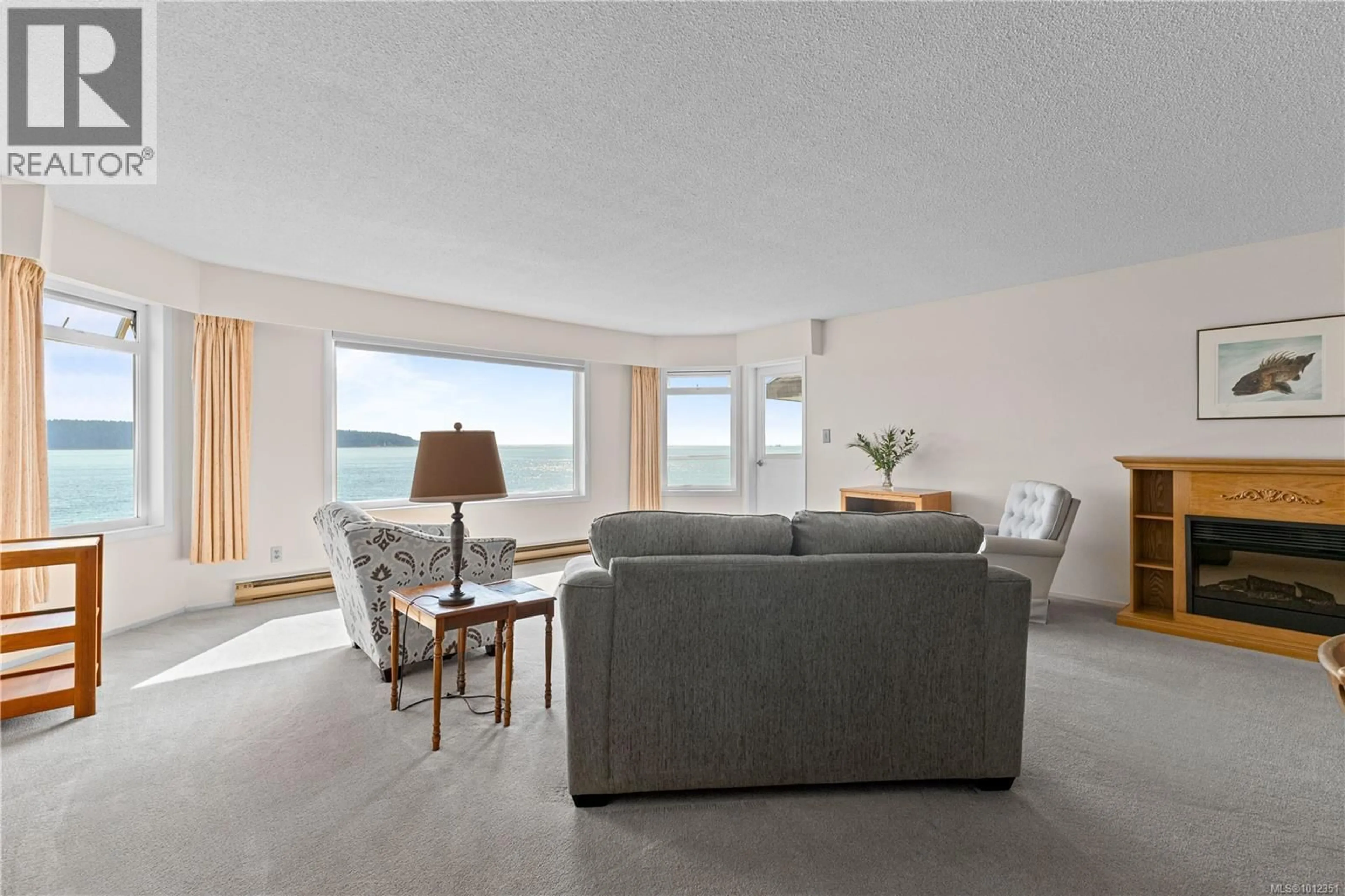 Living room with furniture, unknown for 406 - 169 ISLAND HIGHWAY SOUTH, Campbell River British Columbia V9W6W2