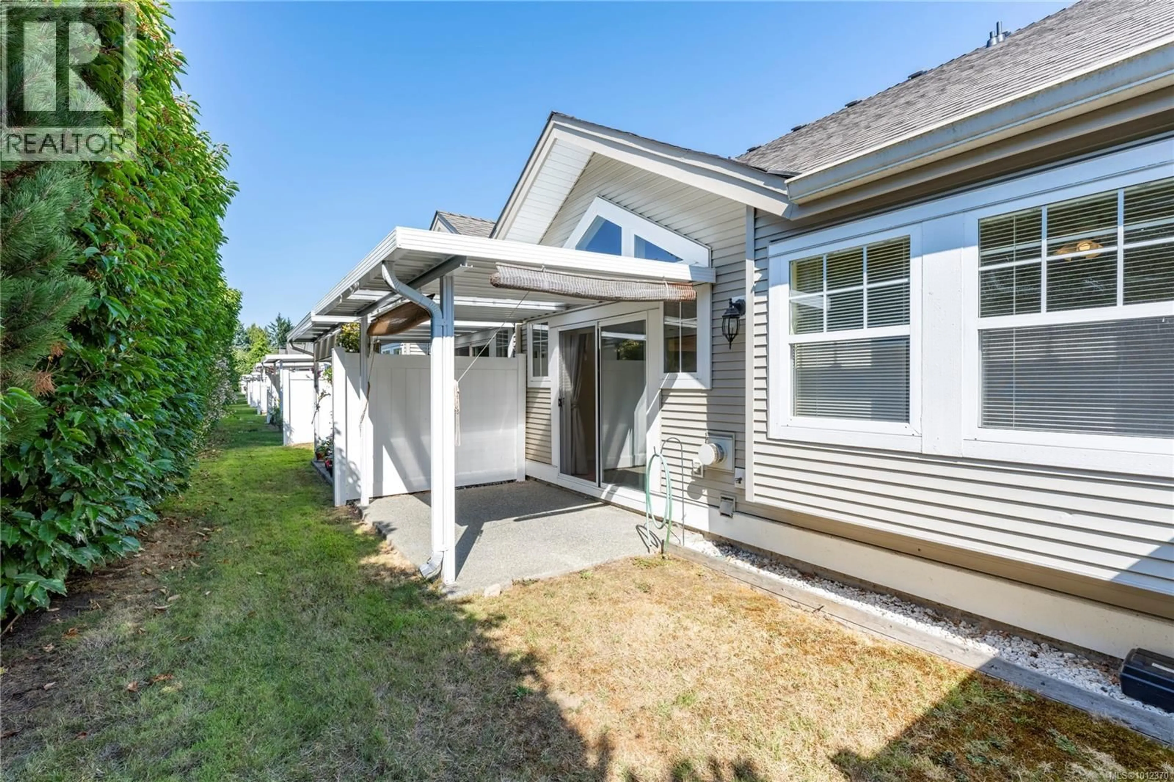 Home with vinyl exterior material, street for 16 - 631 BLENKIN AVENUE, Parksville British Columbia V9P2Z4