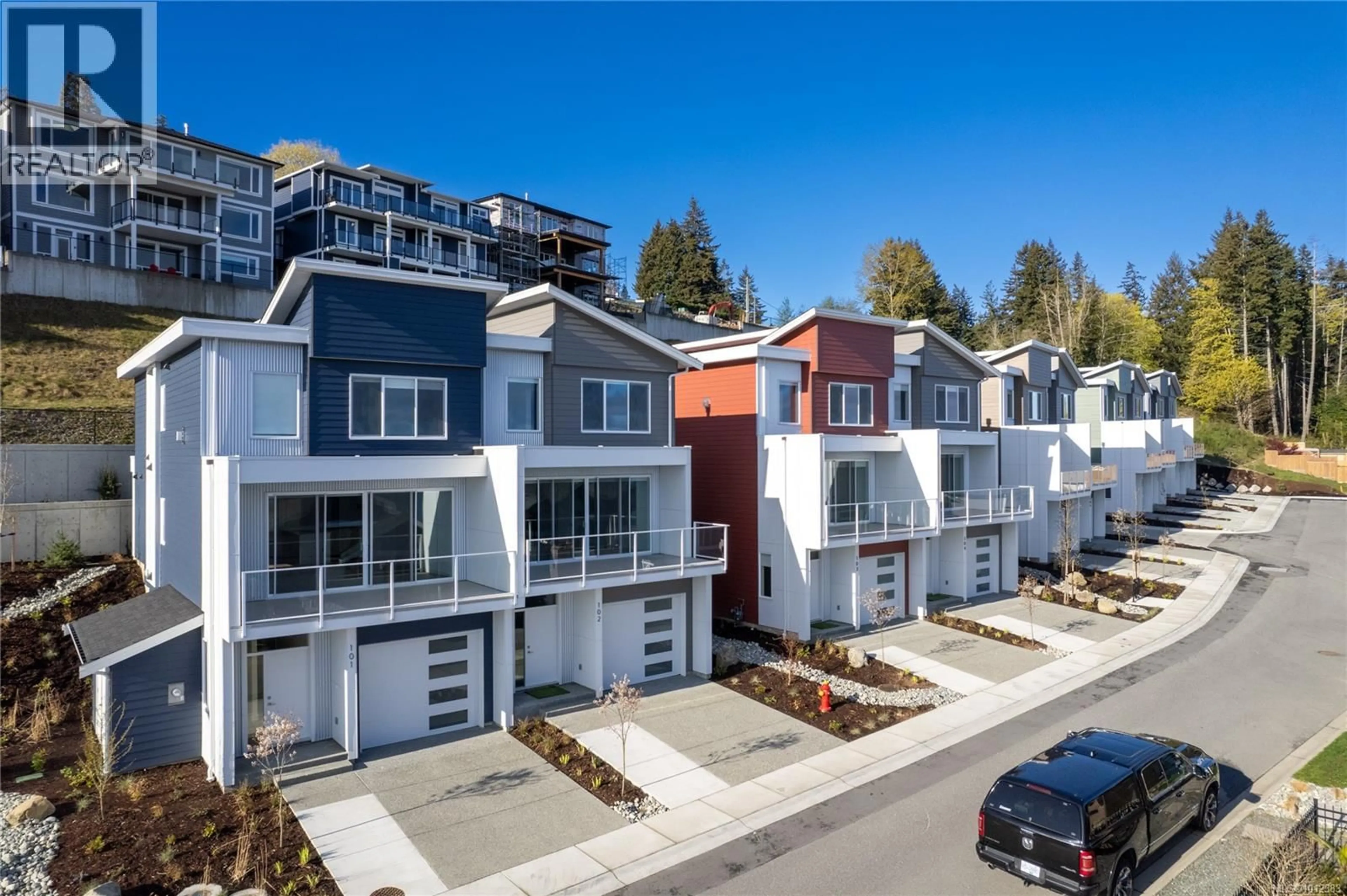 A pic from outside/outdoor area/front of a property/back of a property/a pic from drone, street for 106 - 151 ROYAL PACIFIC WAY, Nanaimo British Columbia V9T0B9