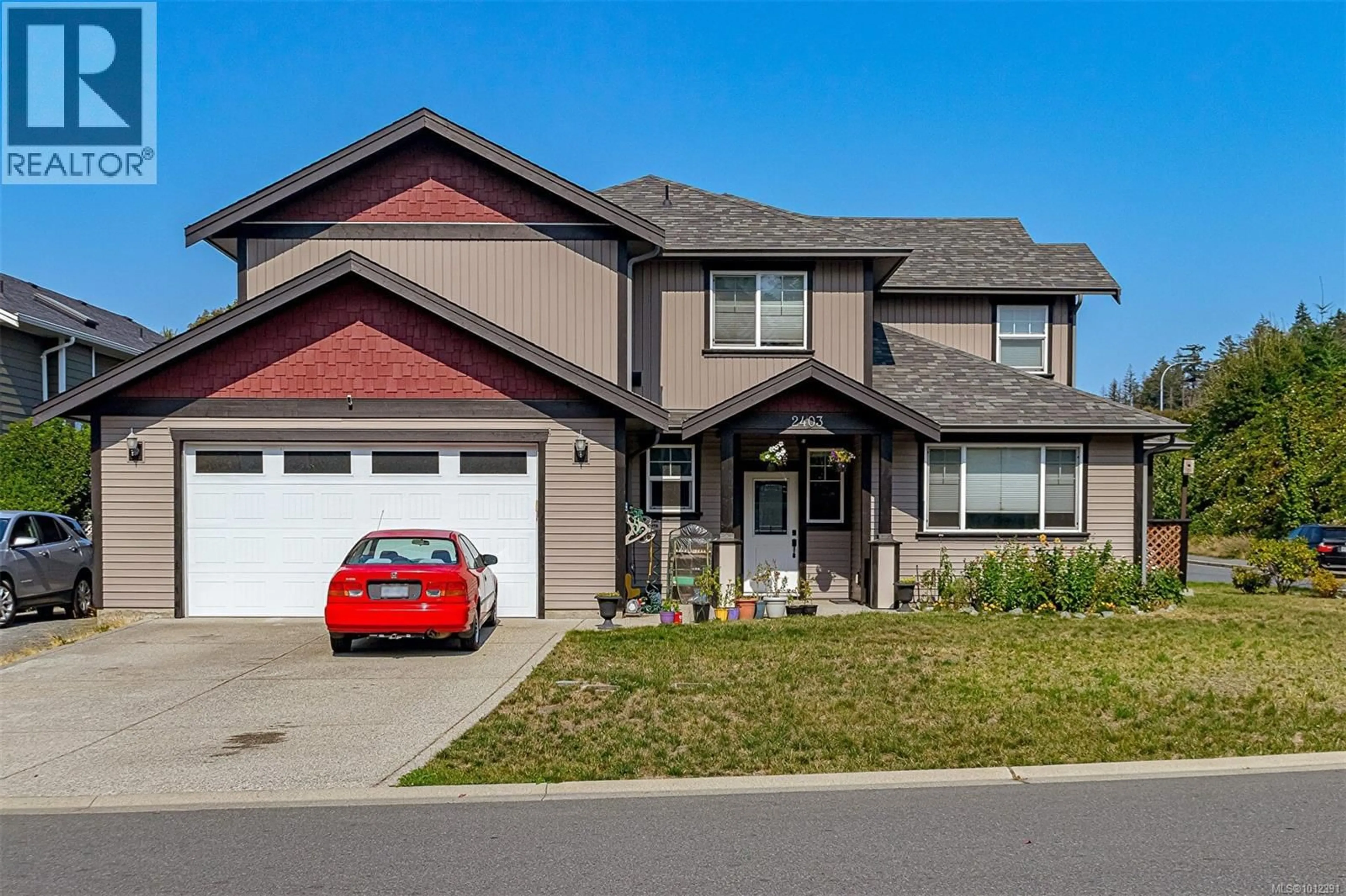 Home with vinyl exterior material, street for 2403 BELLAMY ROAD, Langford British Columbia V9B0R8