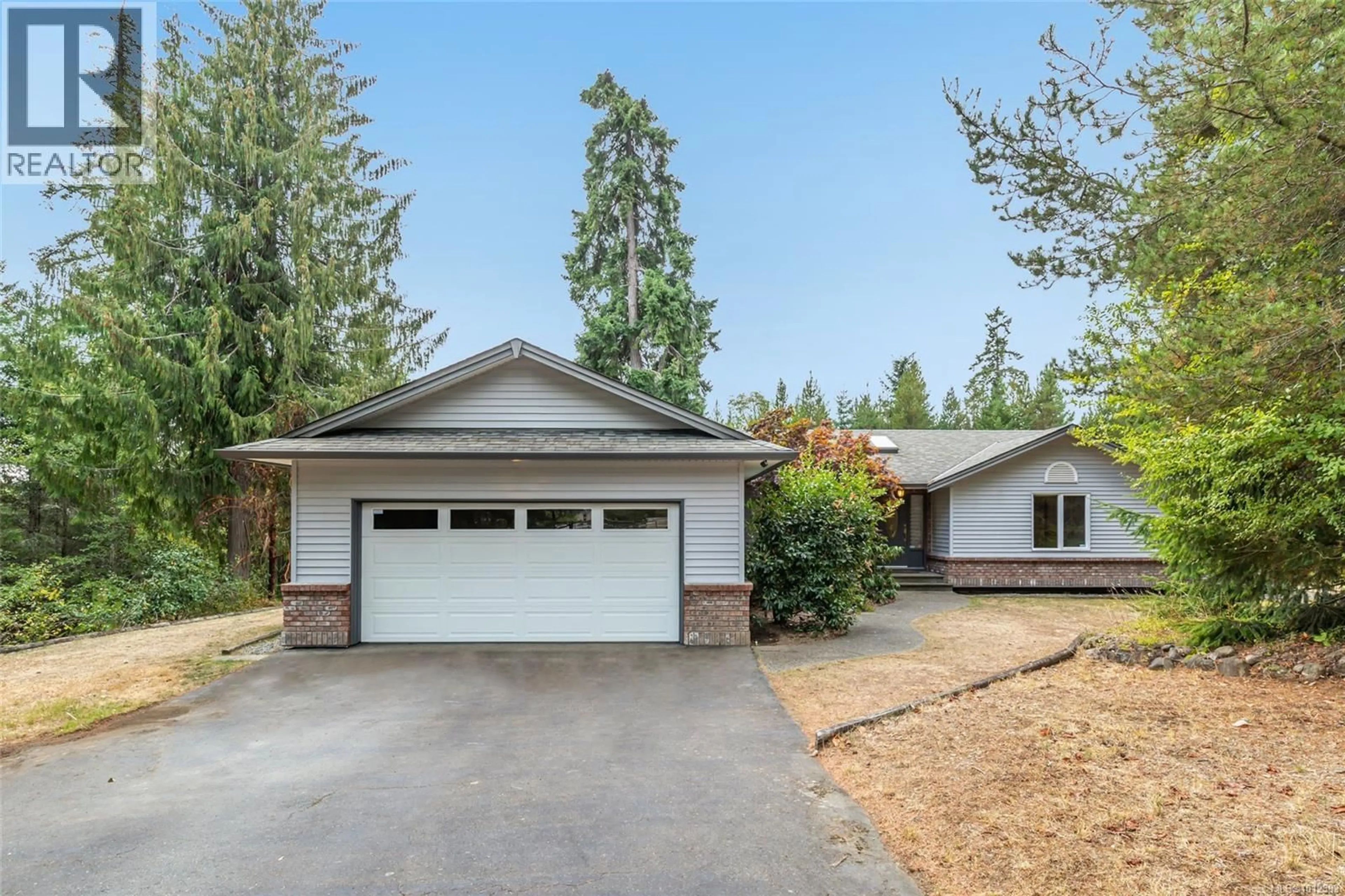 Home with vinyl exterior material, street for 1010 MIDDLEGATE ROAD, Errington British Columbia V0R1V0