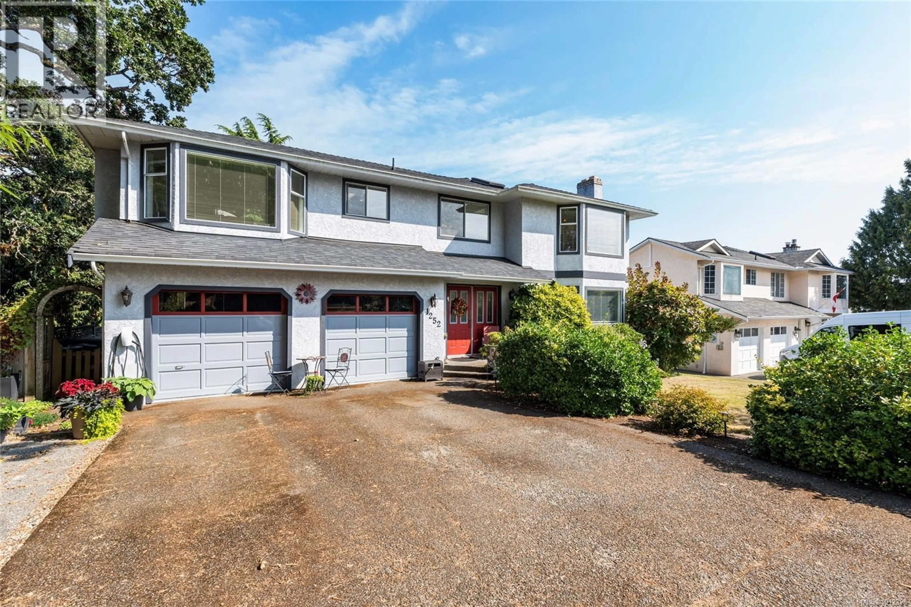 Home with vinyl exterior material, street for 1252 MARIPOSA AVENUE, Saanich British Columbia V8Z6T6