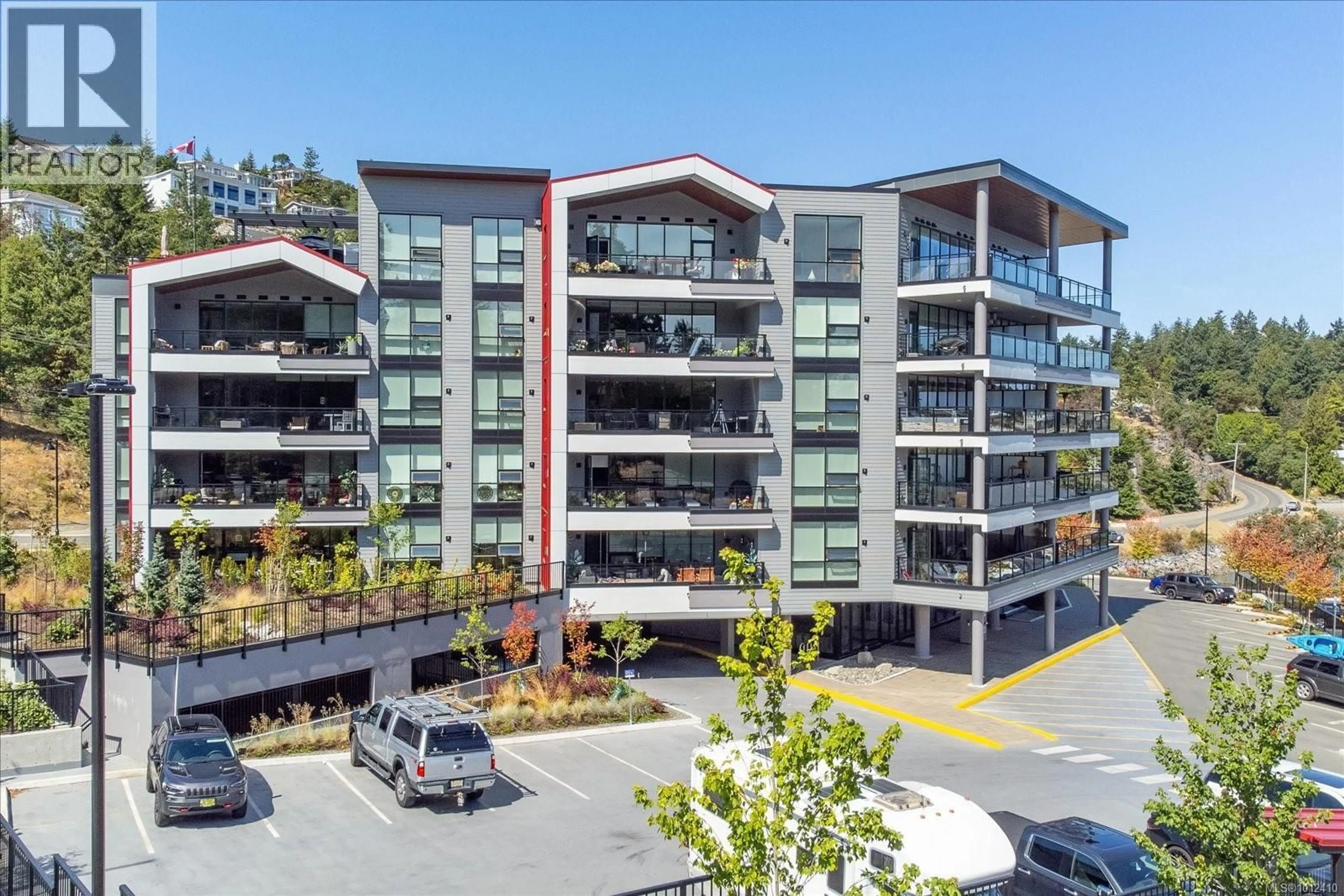 A pic from outside/outdoor area/front of a property/back of a property/a pic from drone, building for 305 - 3529 DOLPHIN DRIVE, Nanoose Bay British Columbia V9P9J7