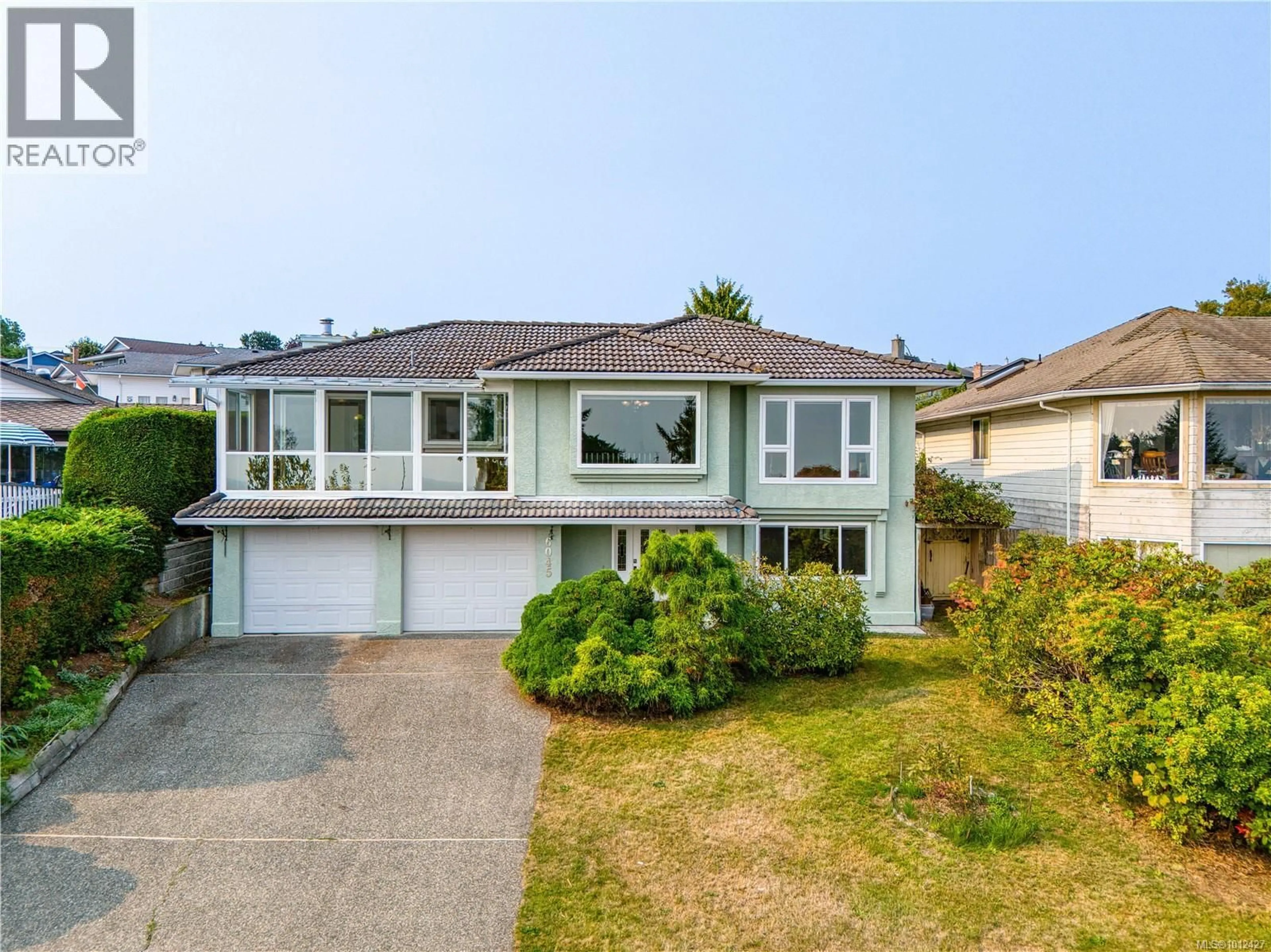 Home with vinyl exterior material, street for 6045 ICARUS DRIVE, Nanaimo British Columbia V9V1B7