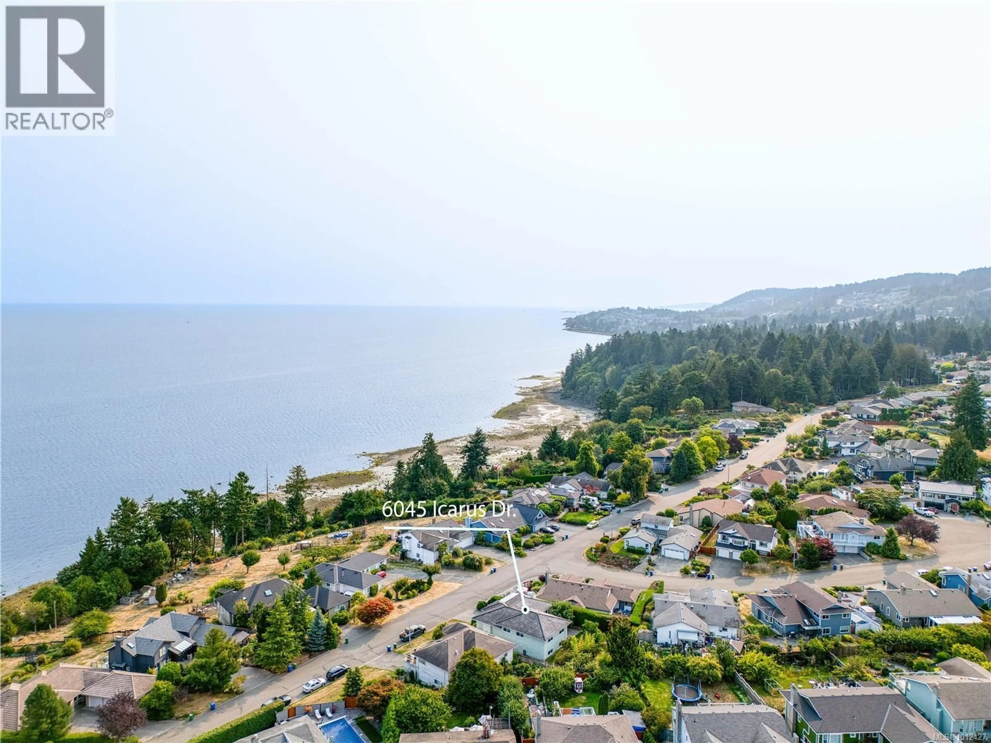 A pic from outside/outdoor area/front of a property/back of a property/a pic from drone, water/lake/river/ocean view for 6045 ICARUS DRIVE, Nanaimo British Columbia V9V1B7