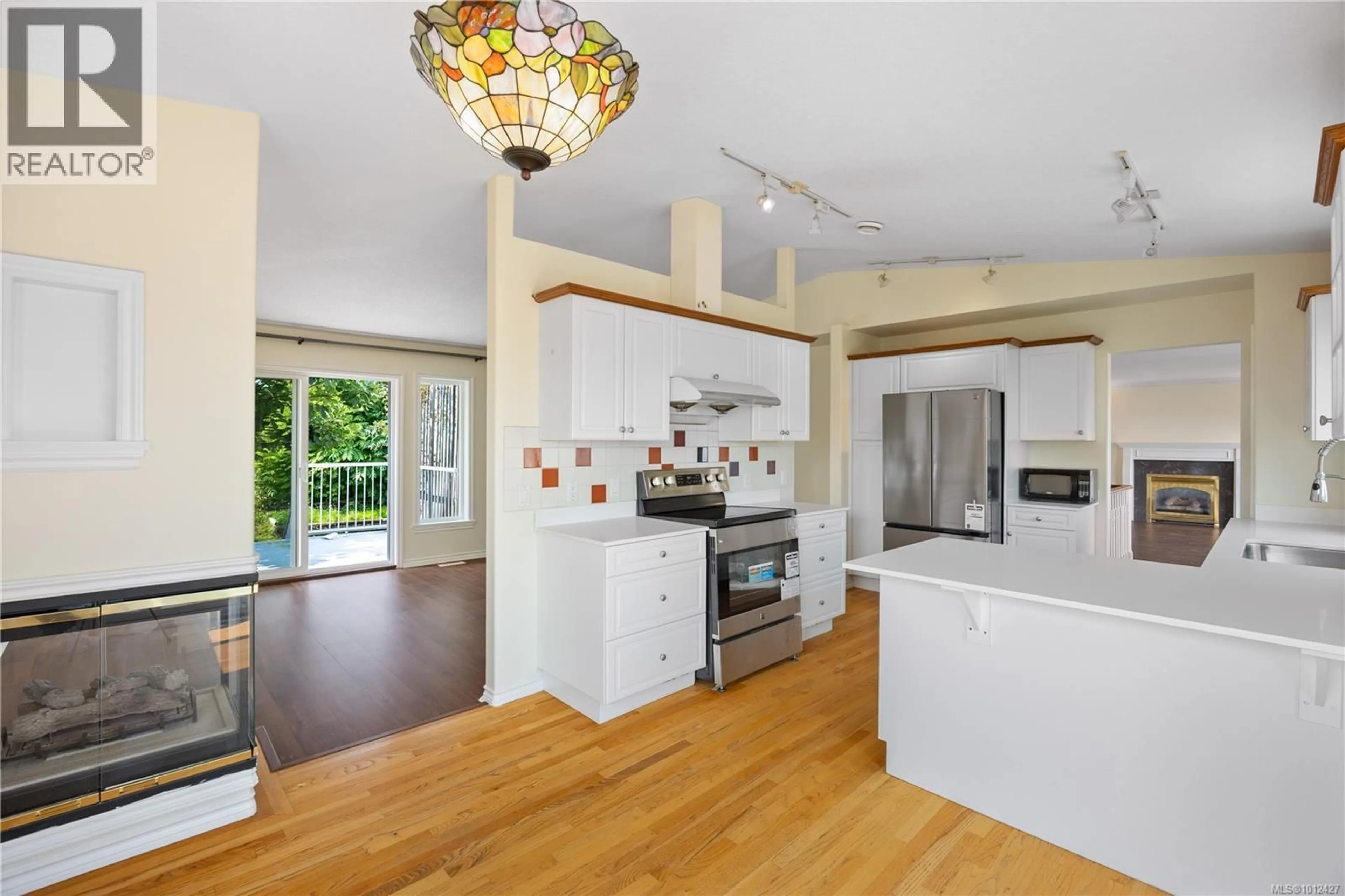 Open concept kitchen, ceramic/tile floor for 6045 ICARUS DRIVE, Nanaimo British Columbia V9V1B7