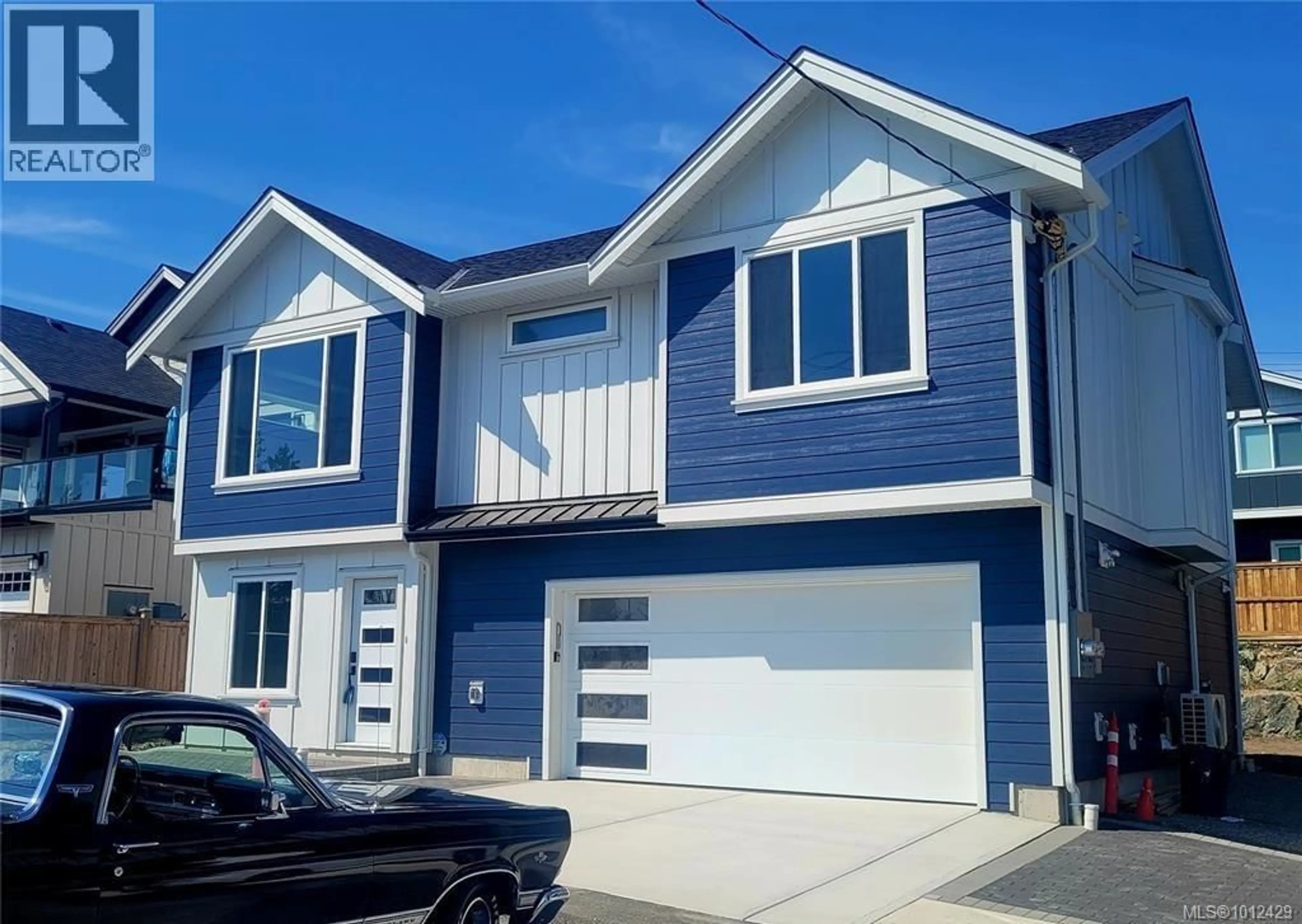 Home with vinyl exterior material, street for 7072 CENTRAL SAANICH ROAD, Central Saanich British Columbia V8M1Y3