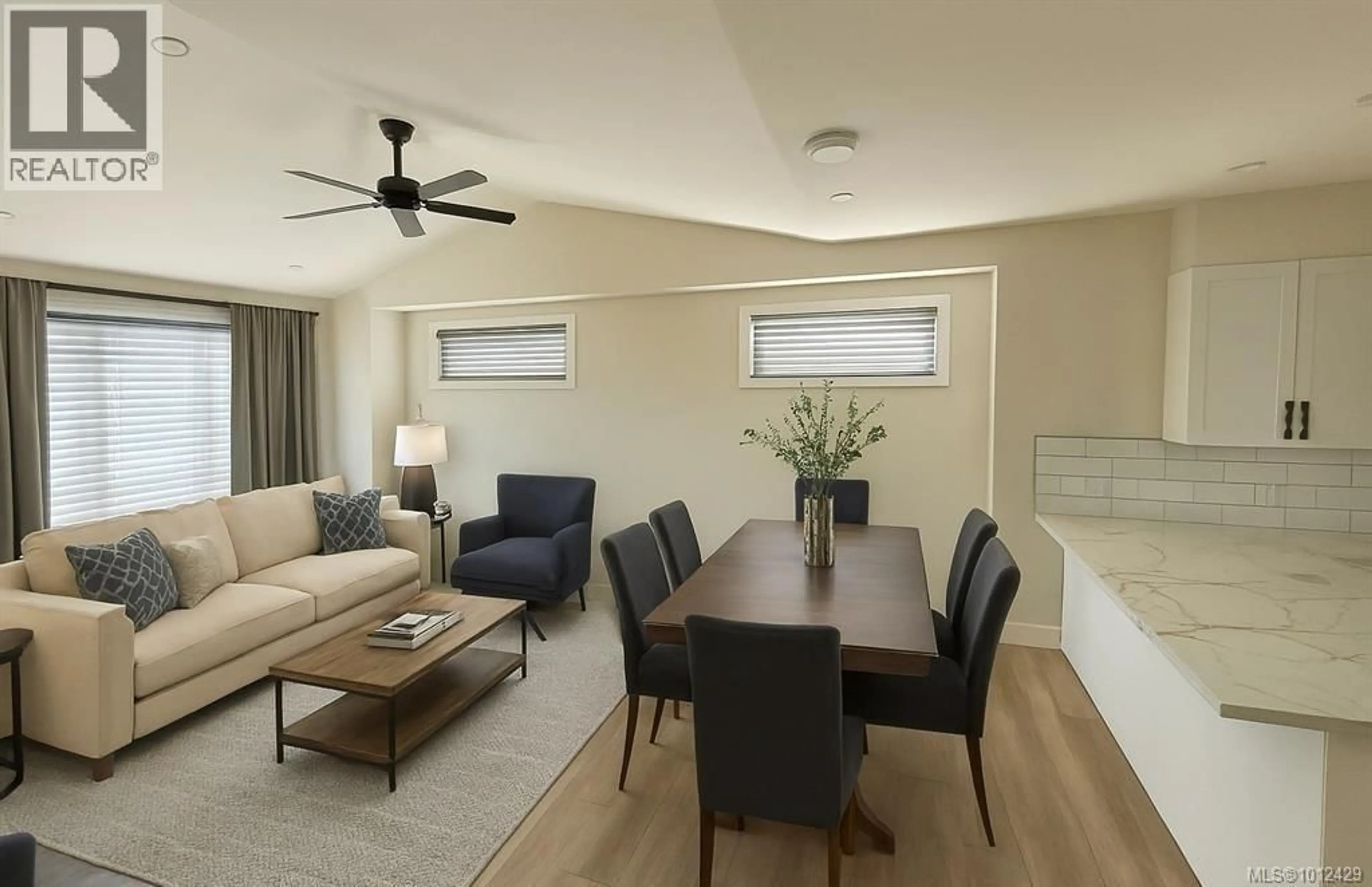 Living room with furniture, wood/laminate floor for 7072 CENTRAL SAANICH ROAD, Central Saanich British Columbia V8M1Y3