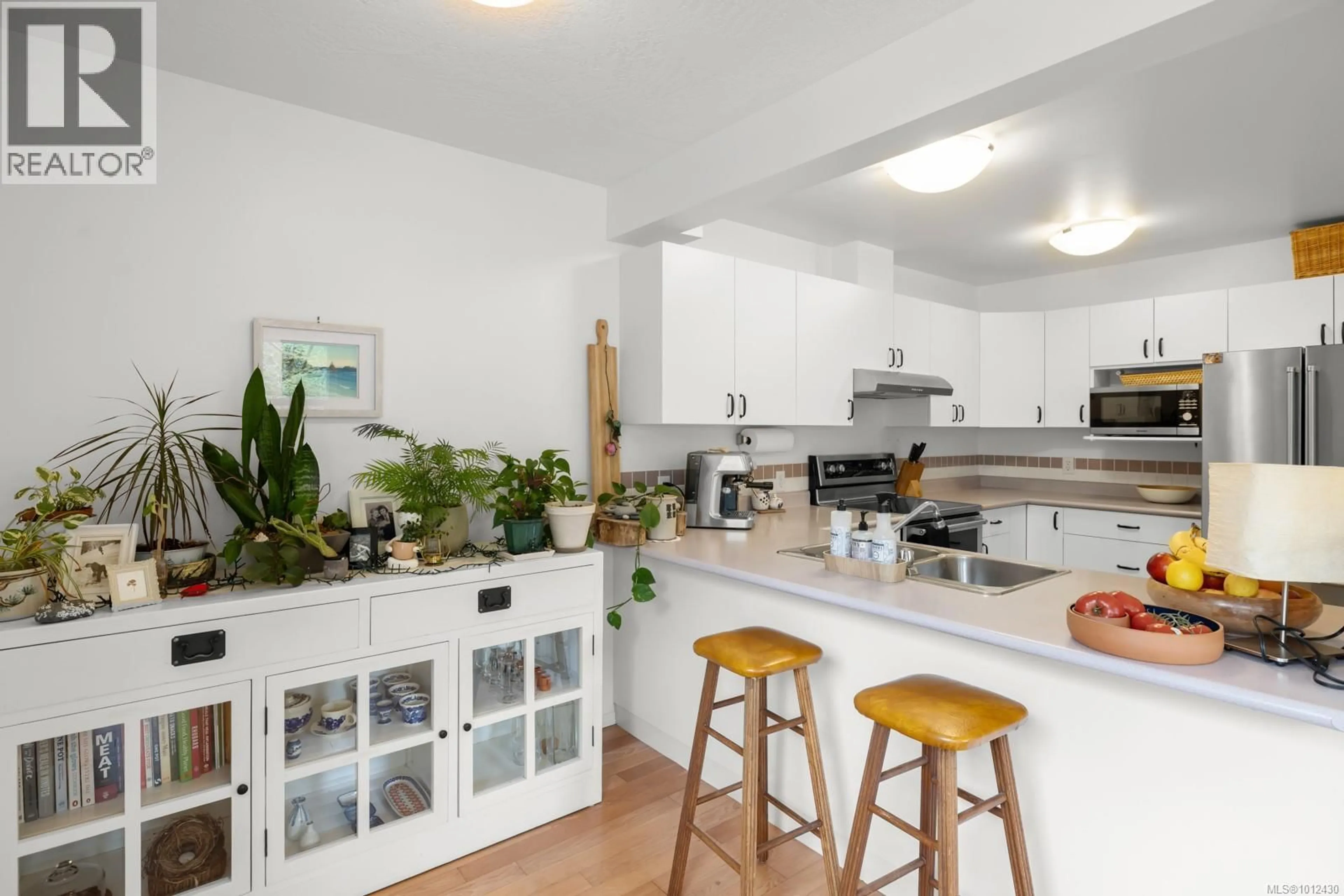 Open concept kitchen, unknown for 10 - 4580 WEST SAANICH ROAD, Saanich British Columbia V8Z3G4