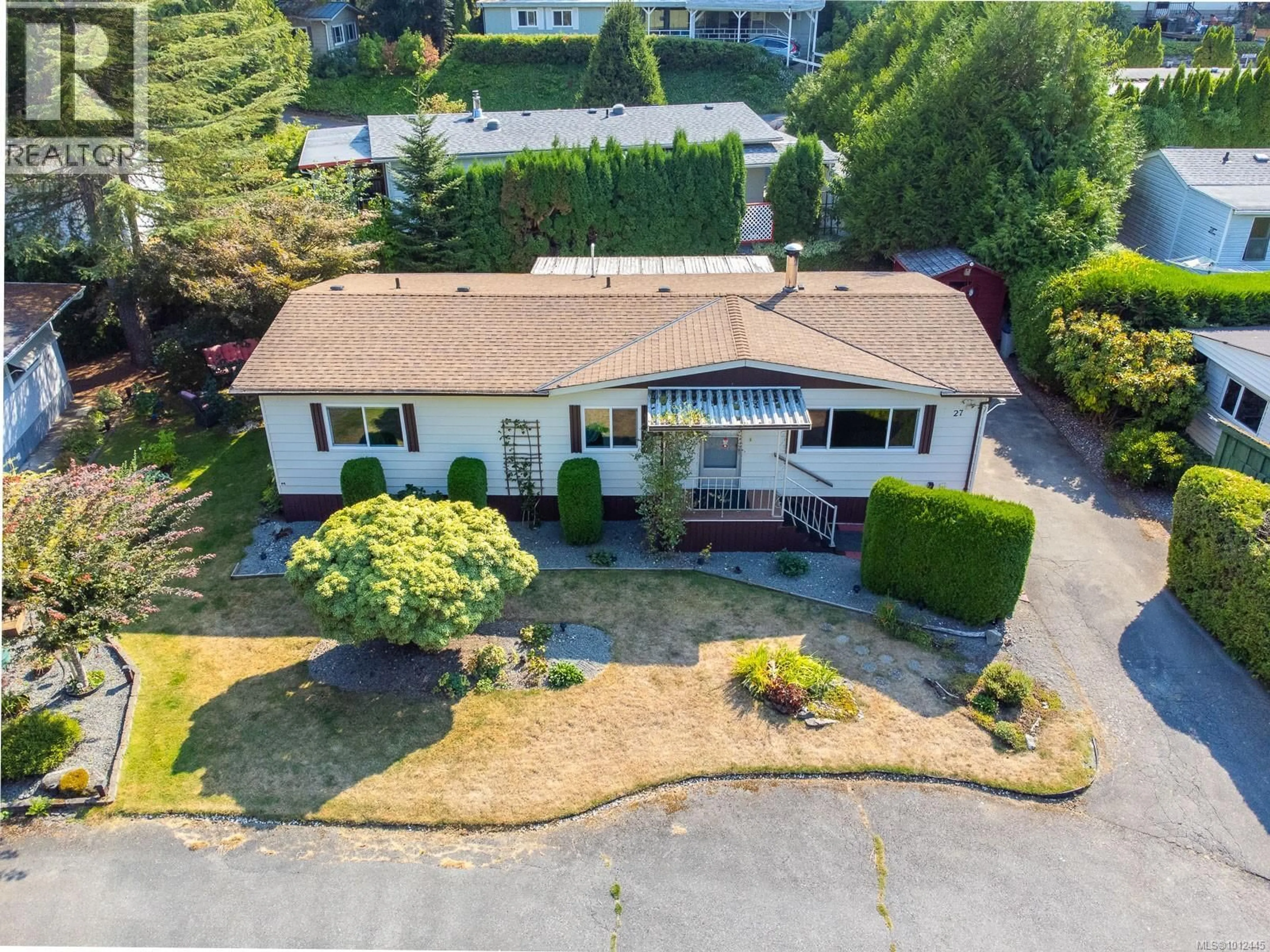 A pic from outside/outdoor area/front of a property/back of a property/a pic from drone, street for 27 - 5150 CHRISTIE ROAD, Ladysmith British Columbia V9G1J2