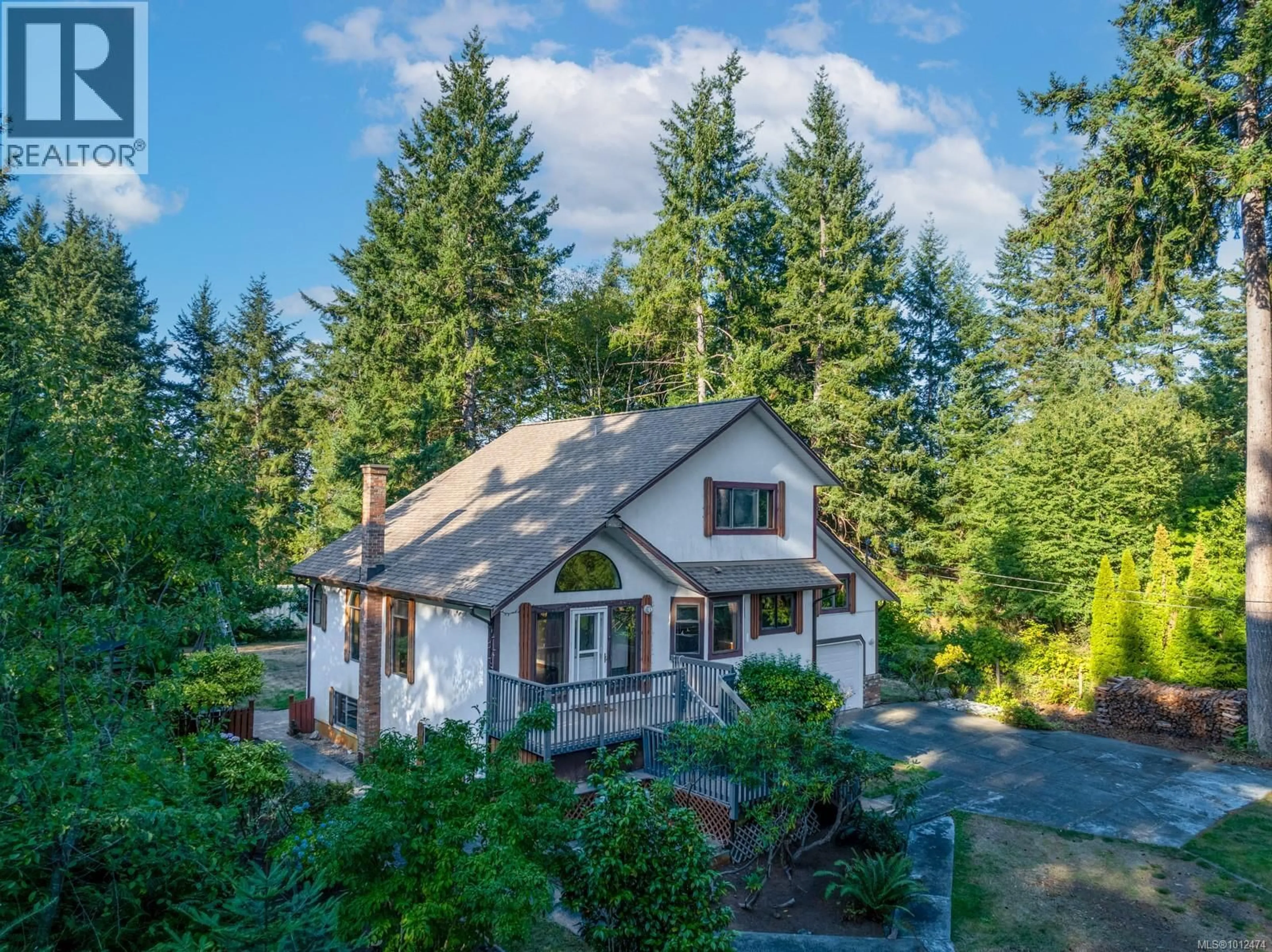 A pic from outside/outdoor area/front of a property/back of a property/a pic from drone, unknown for 1771 FERN ROAD, Courtenay British Columbia V9J1W7