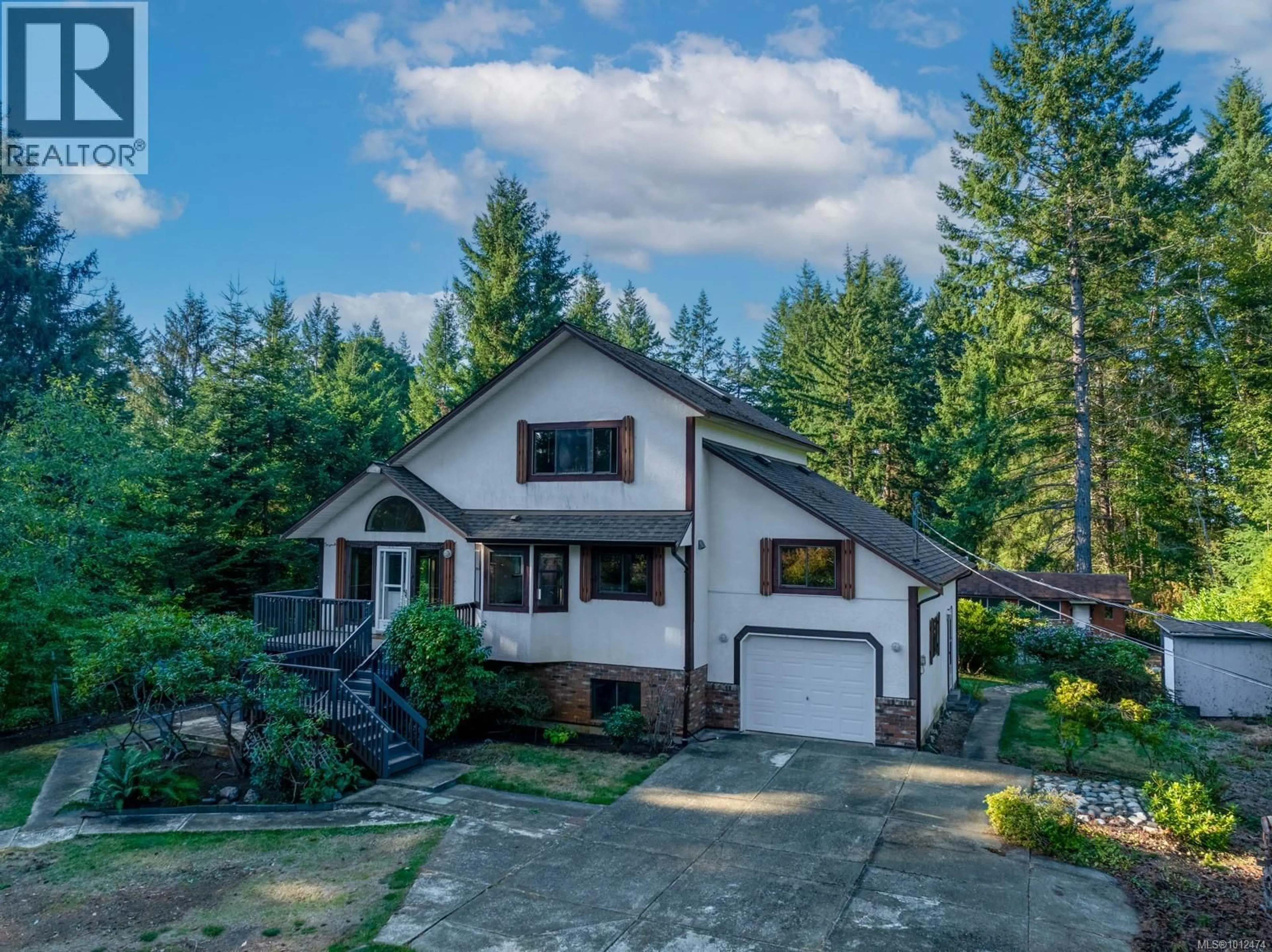 A pic from outside/outdoor area/front of a property/back of a property/a pic from drone, unknown for 1771 FERN ROAD, Courtenay British Columbia V9J1W7