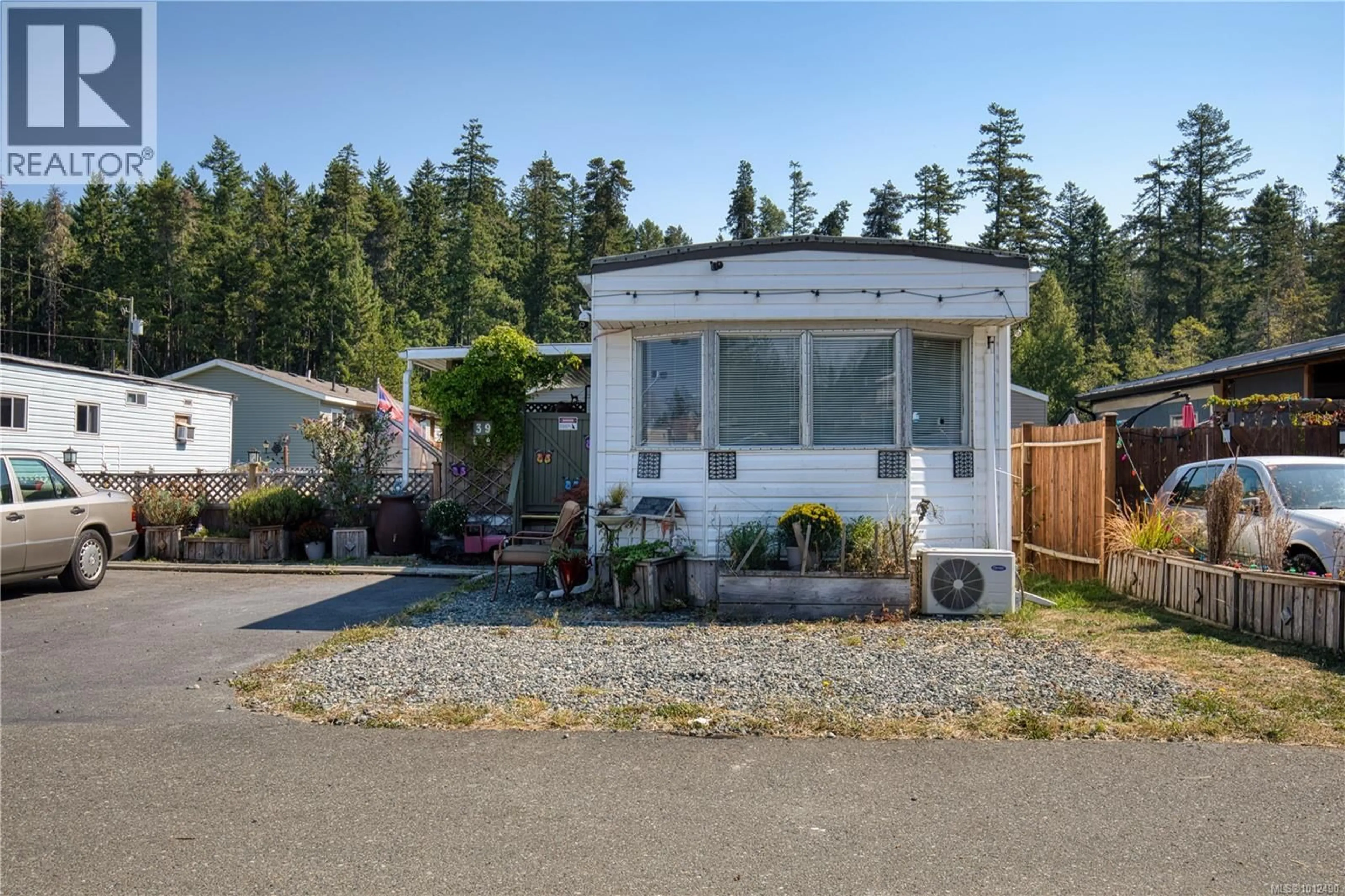 Home with vinyl exterior material, street for 39 - 1050 BOWLBY ROAD, Coombs British Columbia V0R1M0