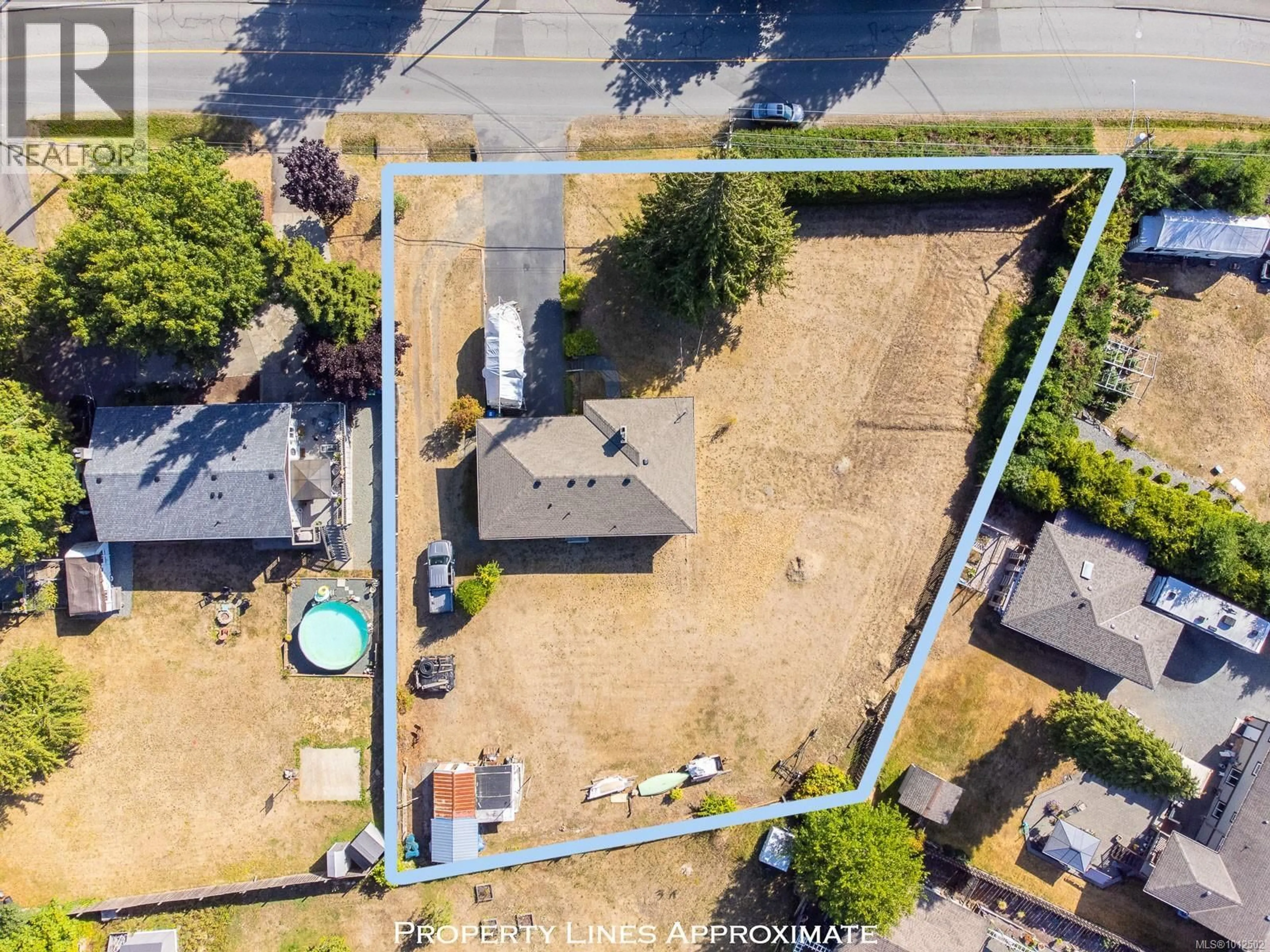A pic from outside/outdoor area/front of a property/back of a property/a pic from drone, street for 1873 RICHARDSON ROAD, Nanaimo British Columbia V9X1C5