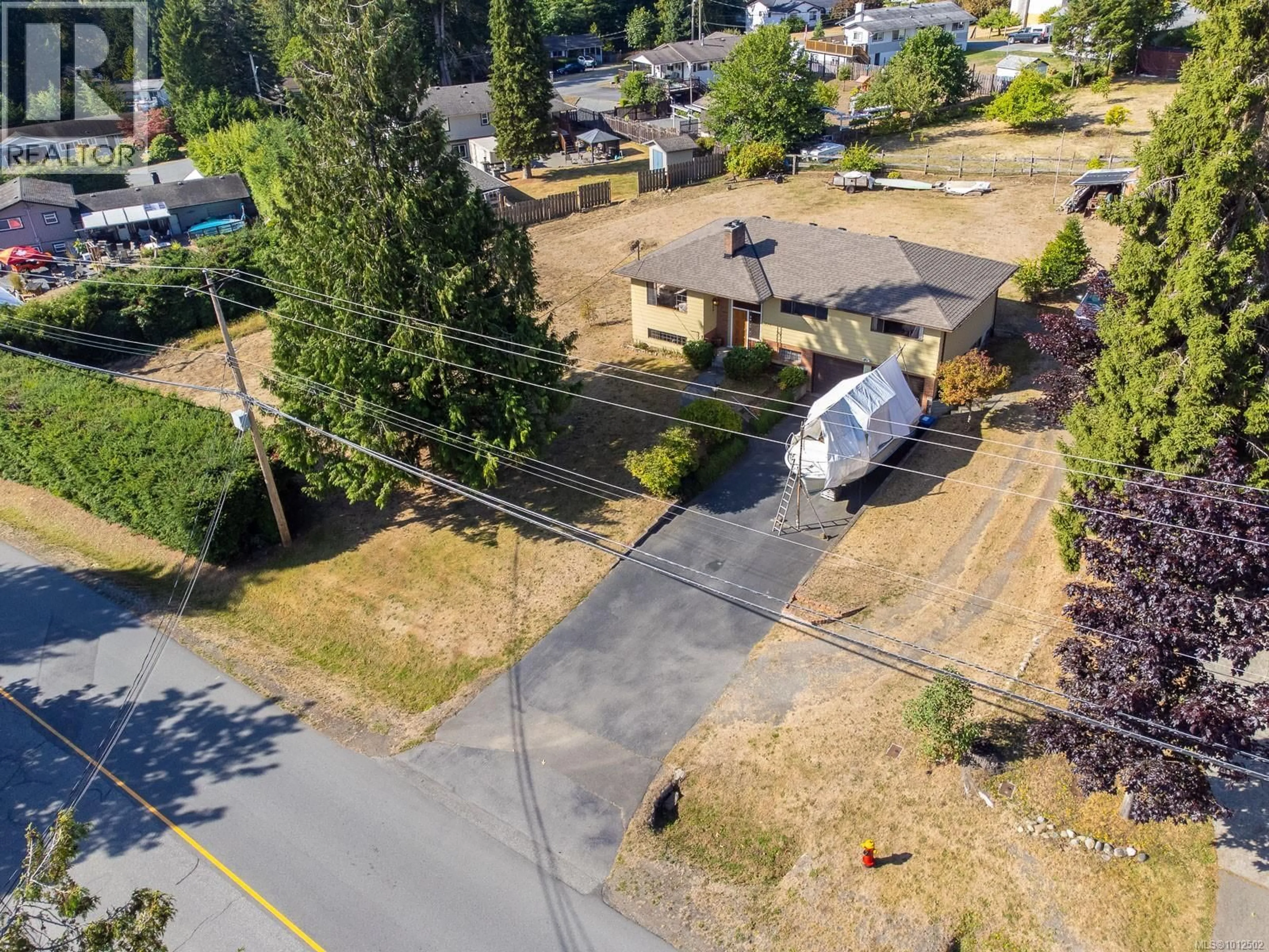 A pic from outside/outdoor area/front of a property/back of a property/a pic from drone, street for 1873 RICHARDSON ROAD, Nanaimo British Columbia V9X1C5