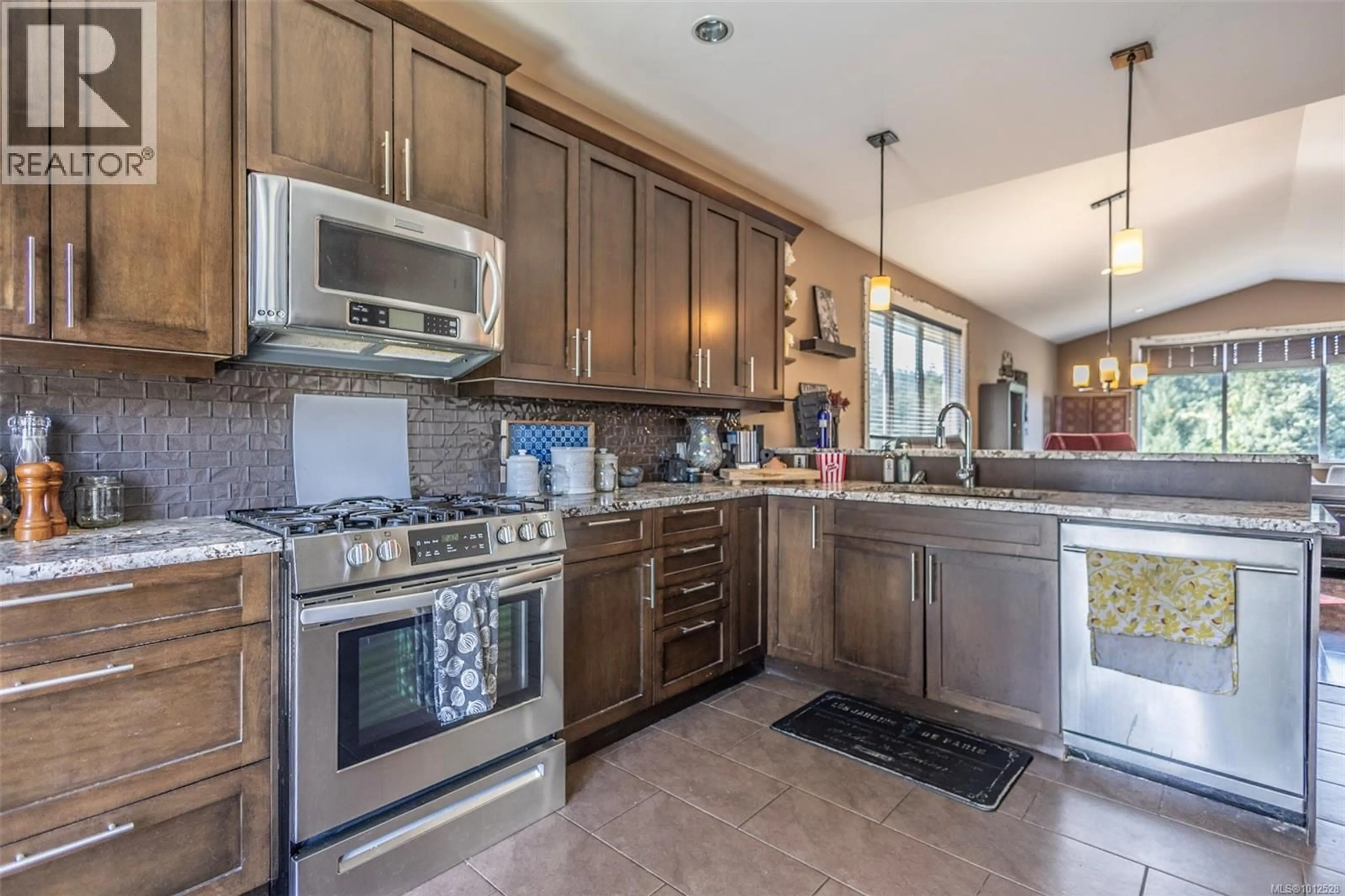 Open concept kitchen, ceramic/tile floor for 3353 SEWELL ROAD, Colwood British Columbia V9C0B9